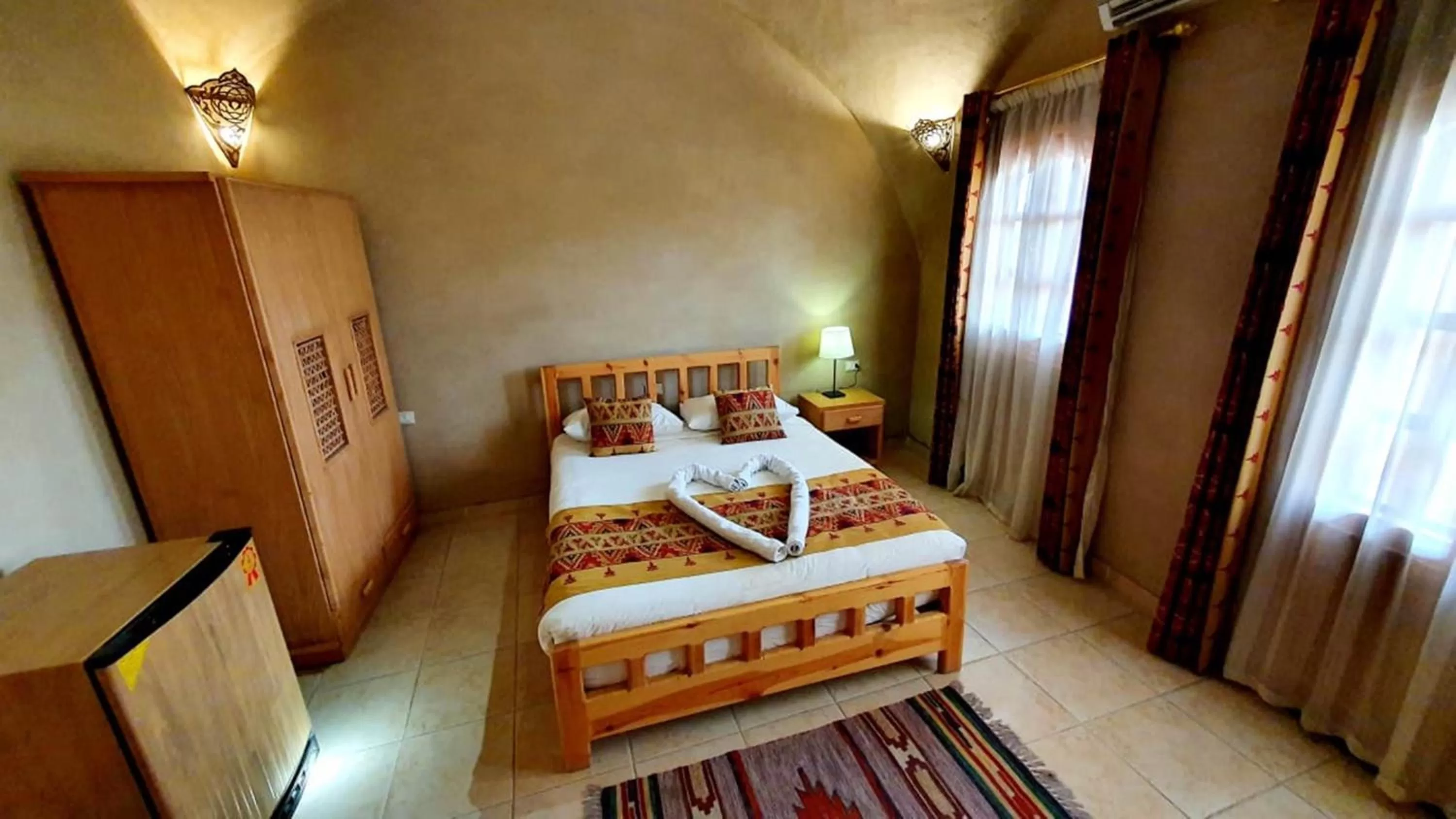 Bed in Embrace Hotel