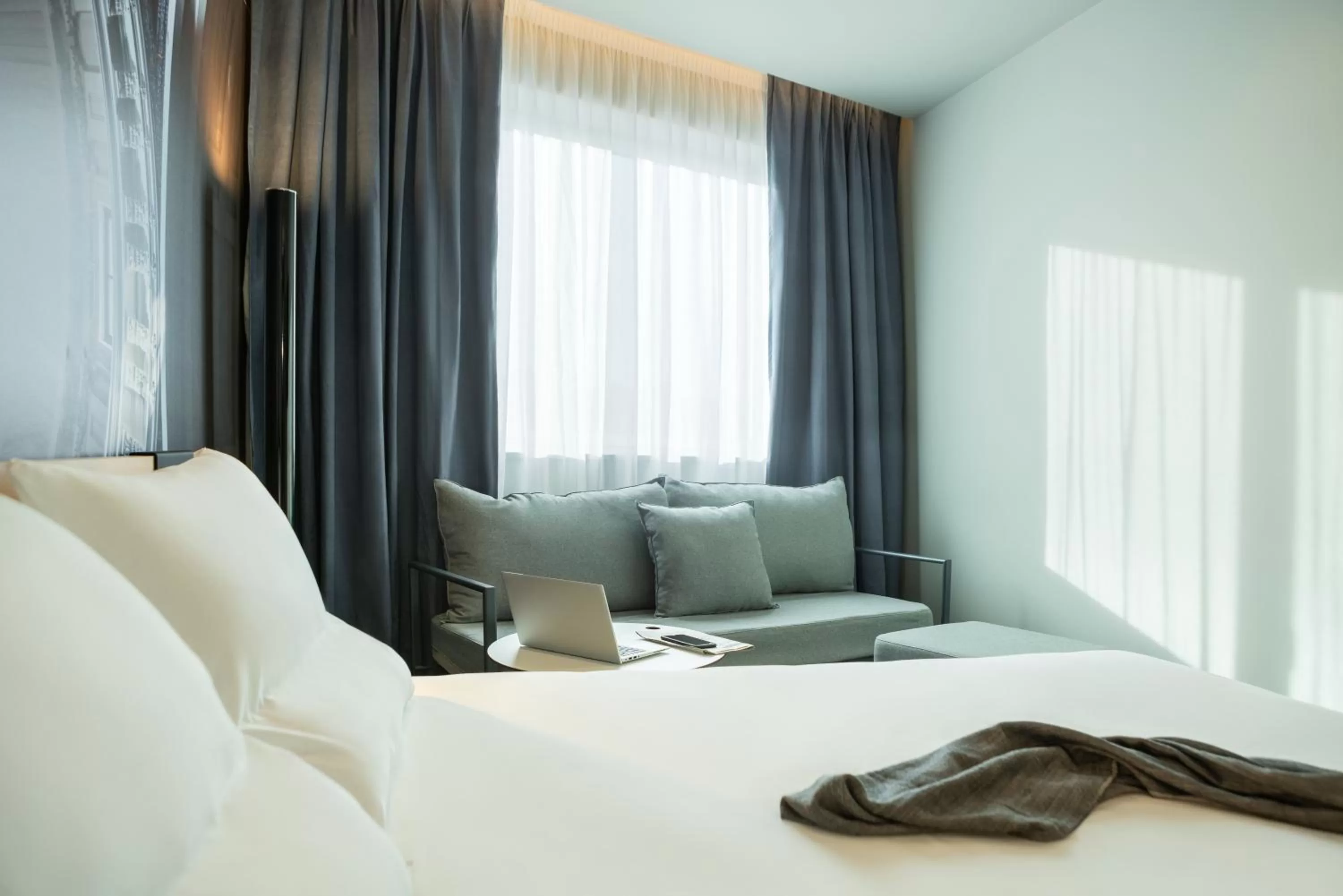 Bed in Novotel Paris 20 Belleville