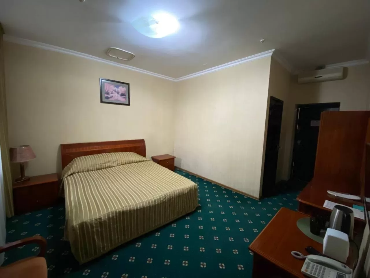 Bed in Deluxe SPA-Hotel