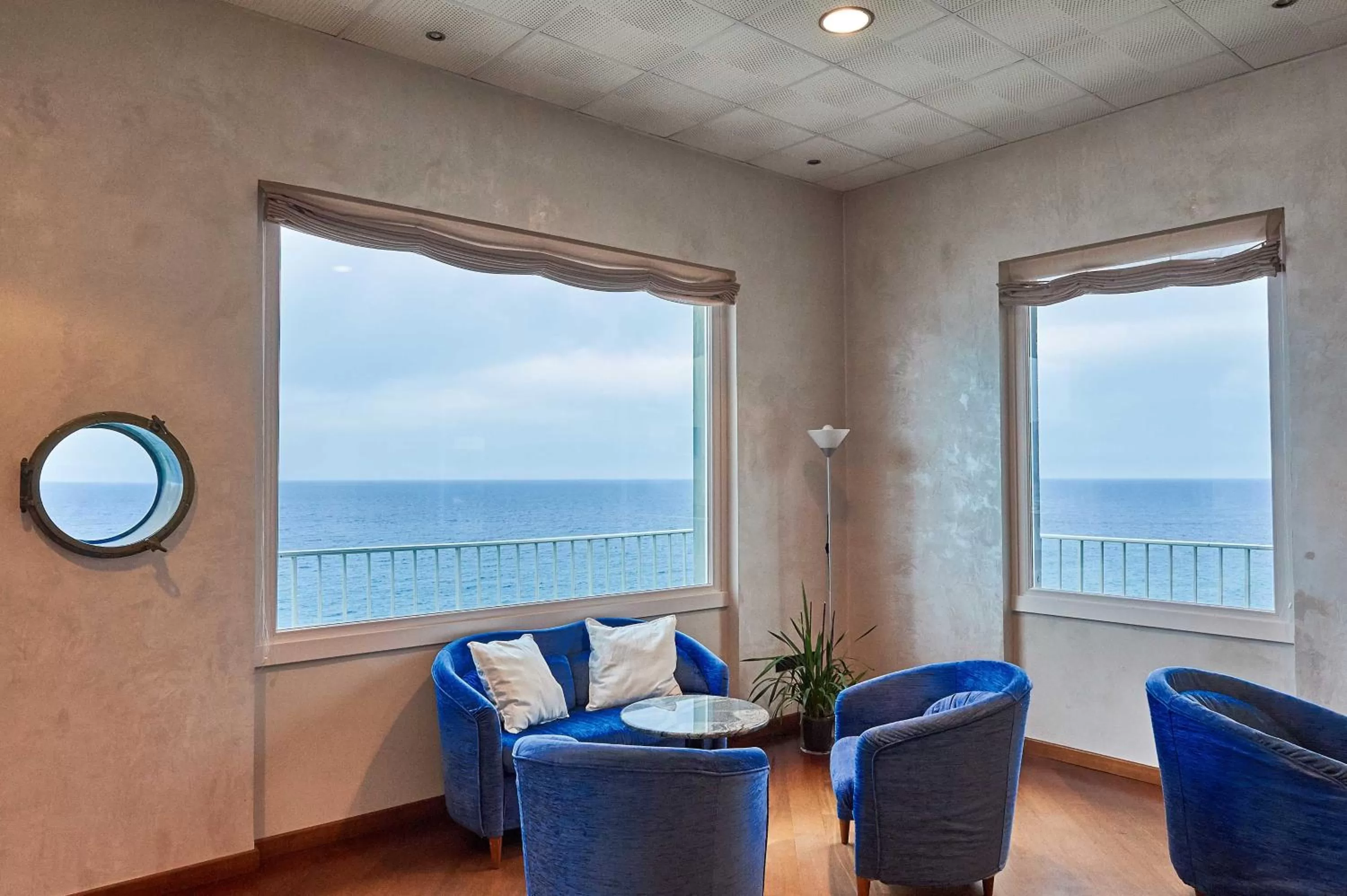 Communal lounge/ TV room in Hotel Corallo