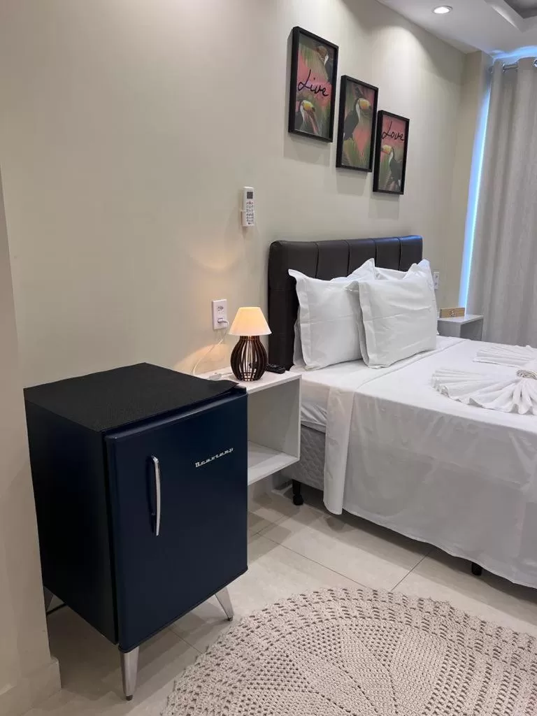 Bed in Pousada Arraial Tropical