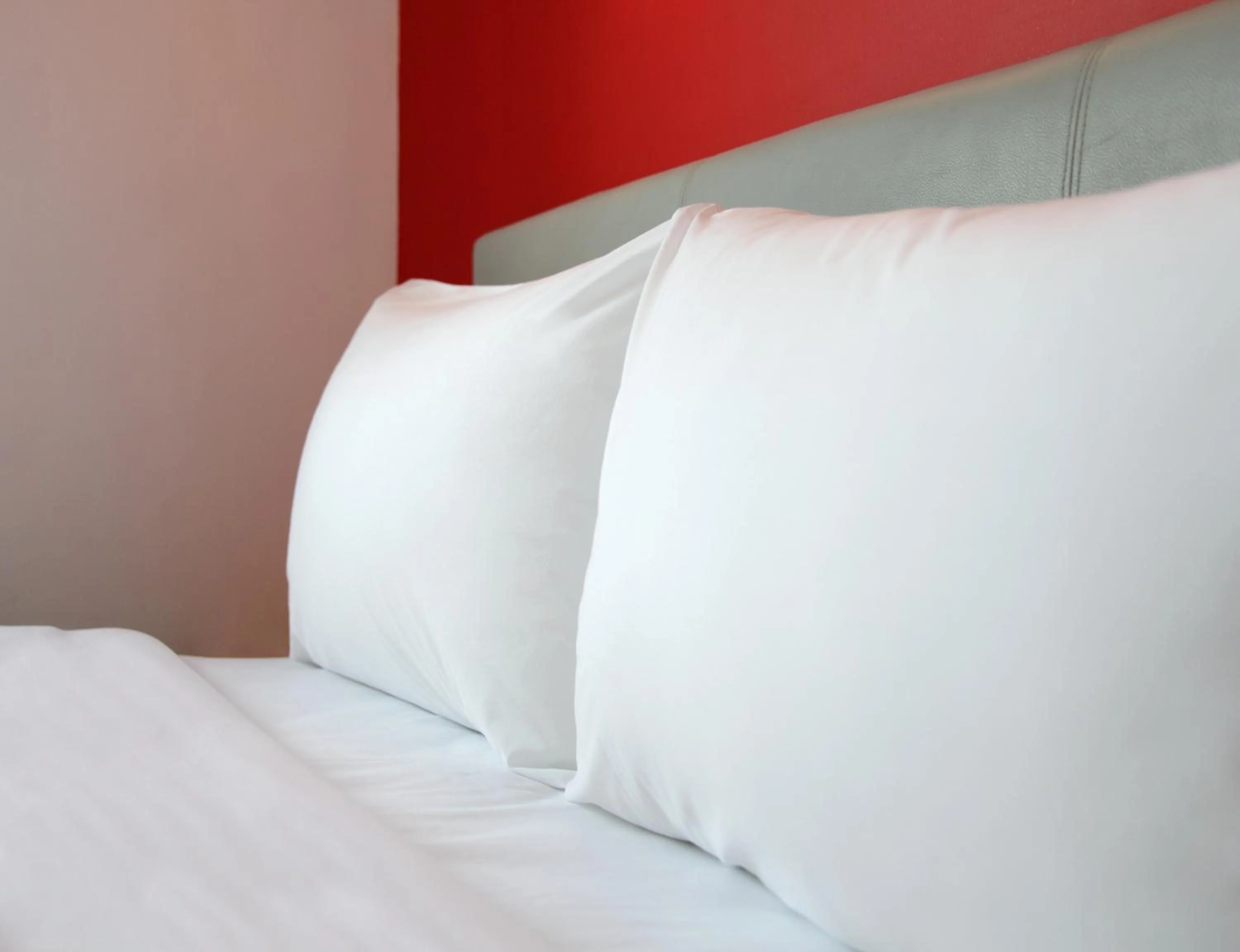 Bed in Amaris Hotel Tendean