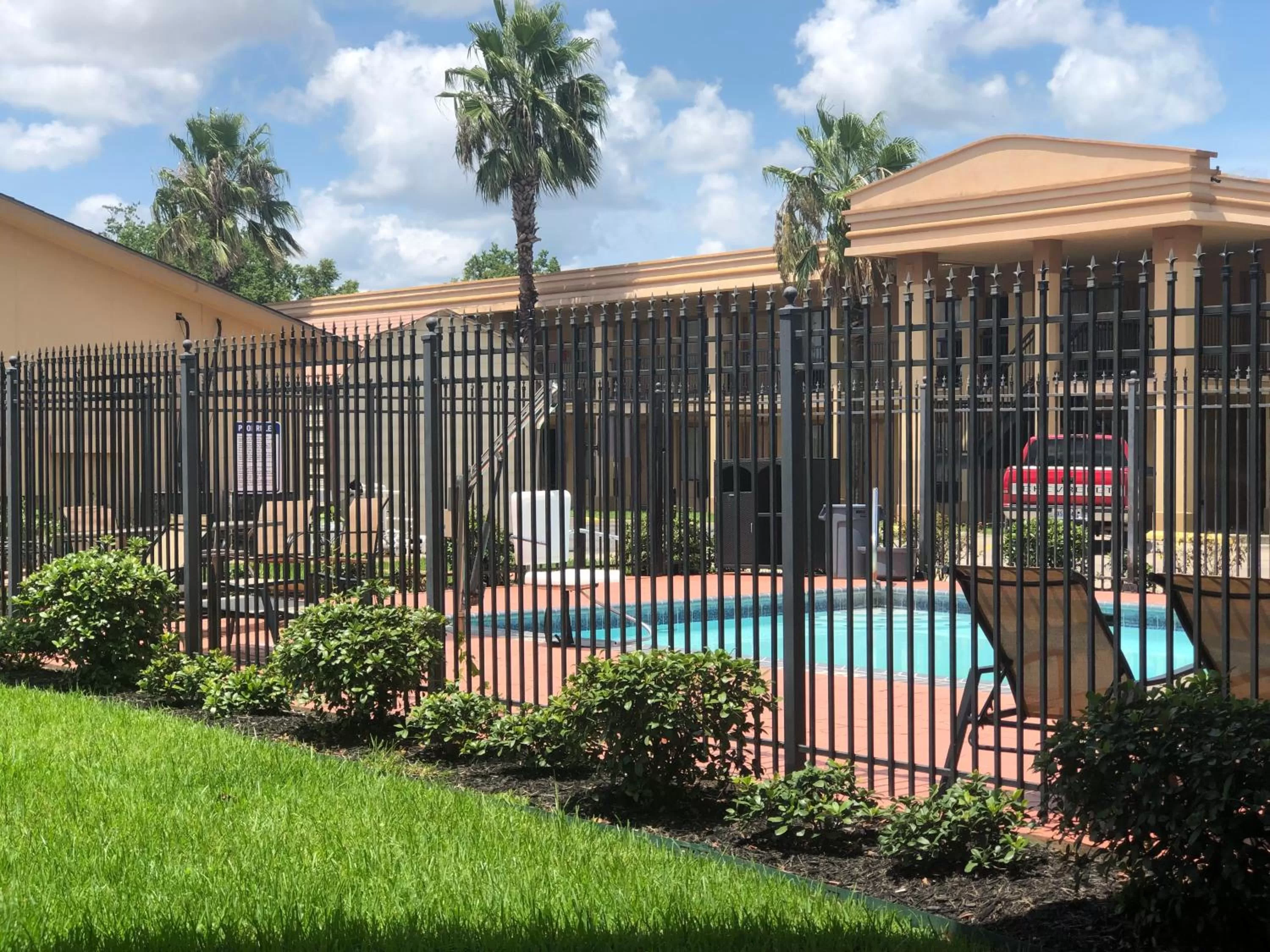 Property building in Days Inn by Wyndham Lake Charles