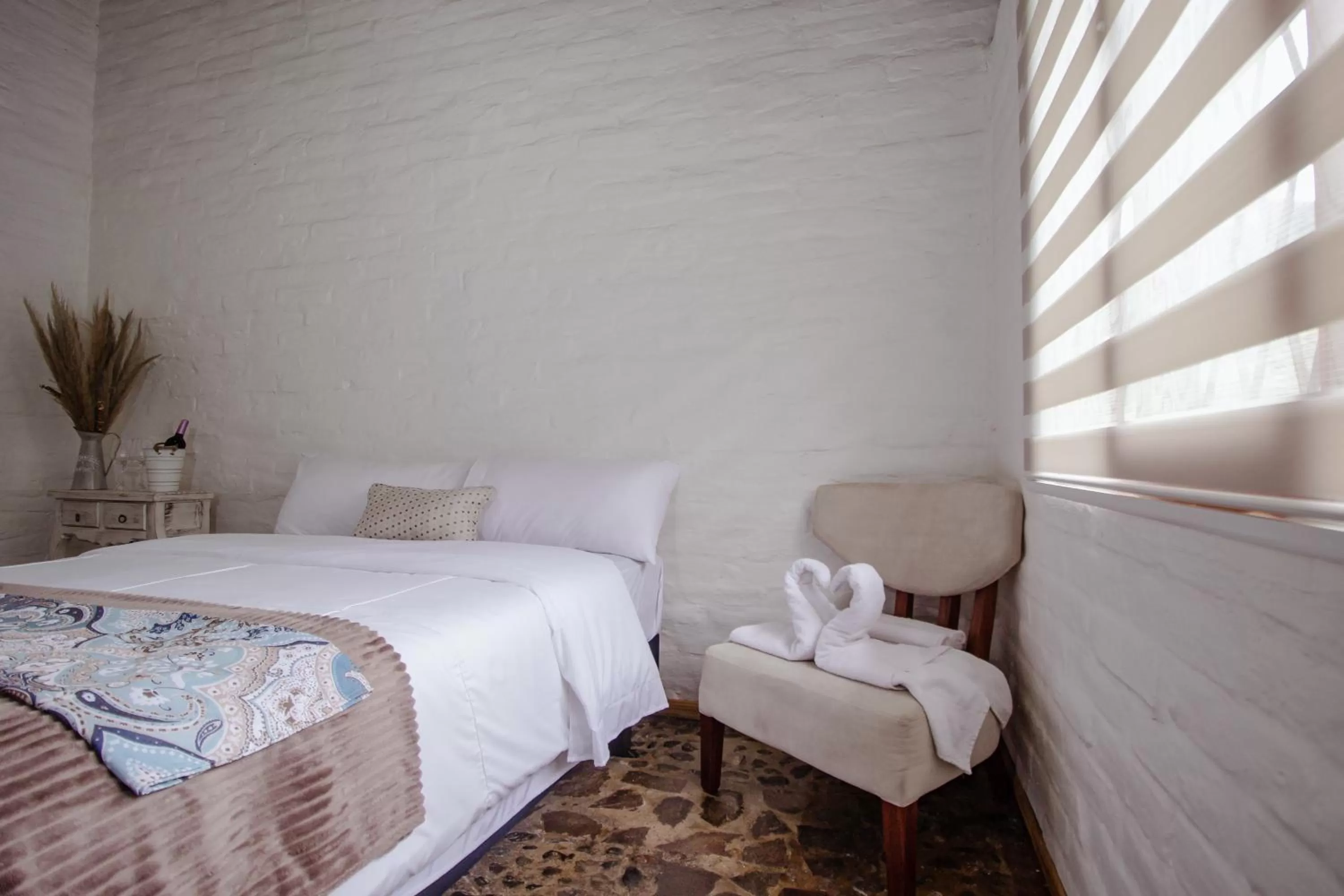 Bed in Rústic Hotel Quinta La Aurora