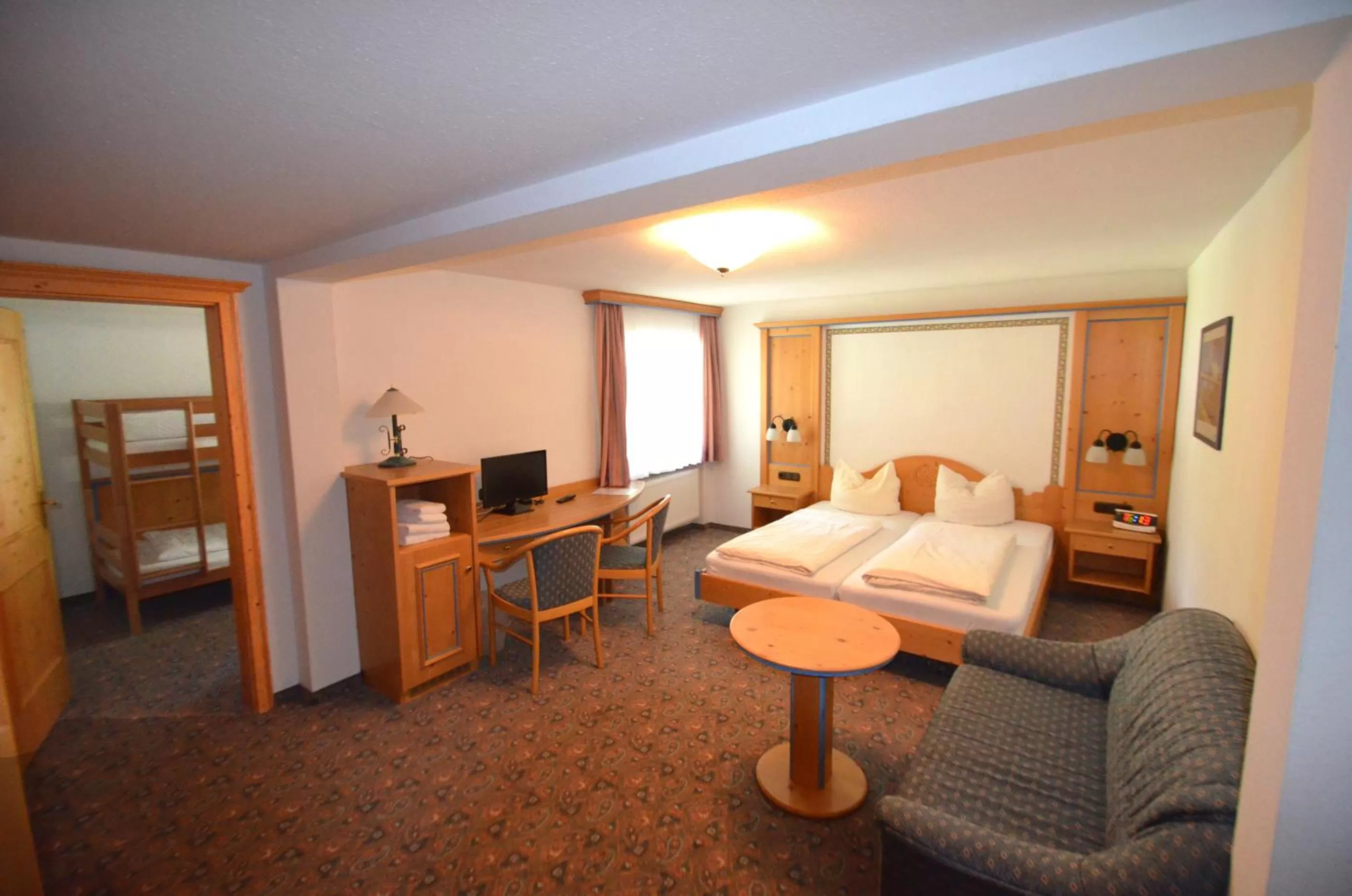 Photo of the whole room, Bed in Alpenhotel Widderstein