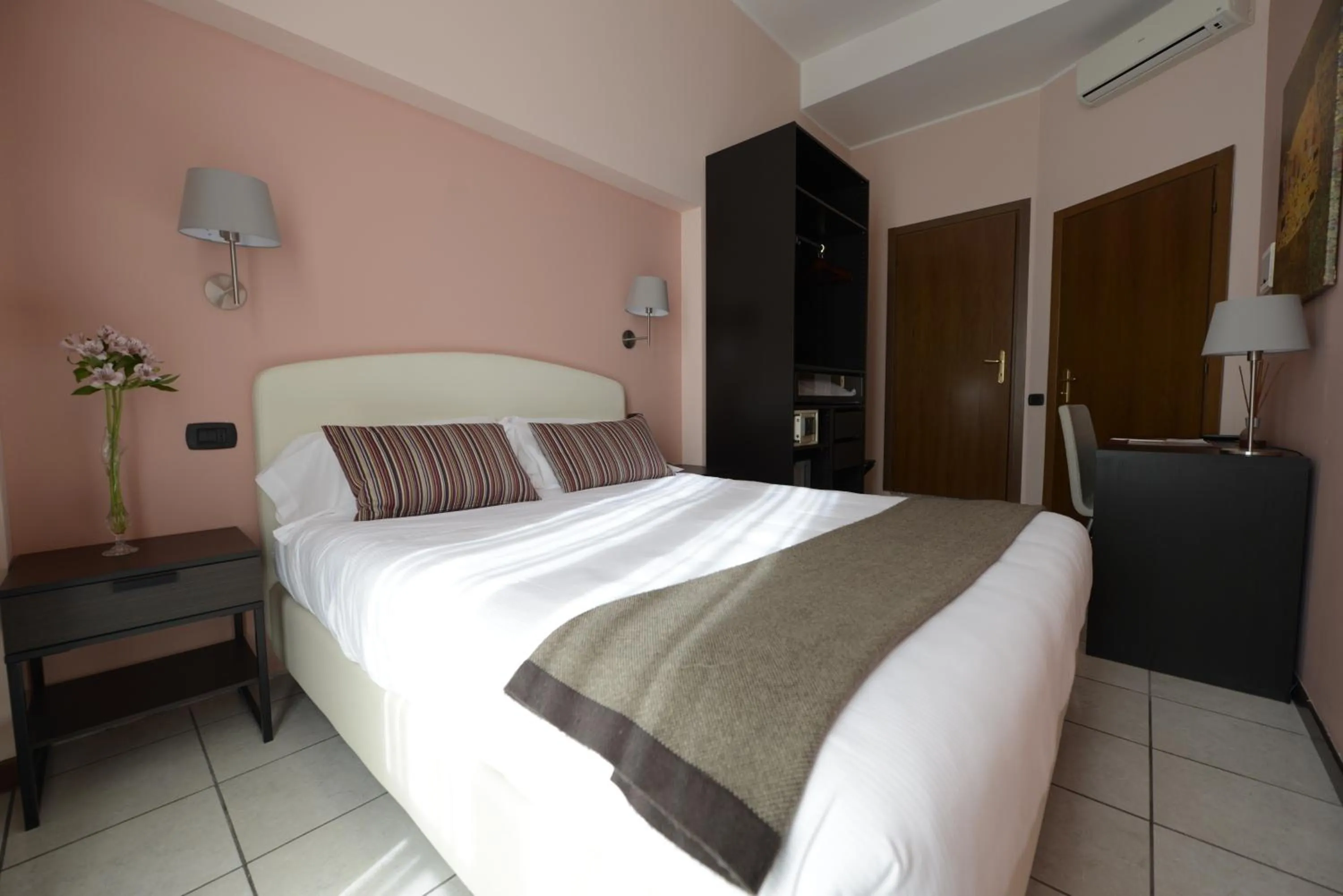 Decorative detail, Bed in Hotel Florence Milano