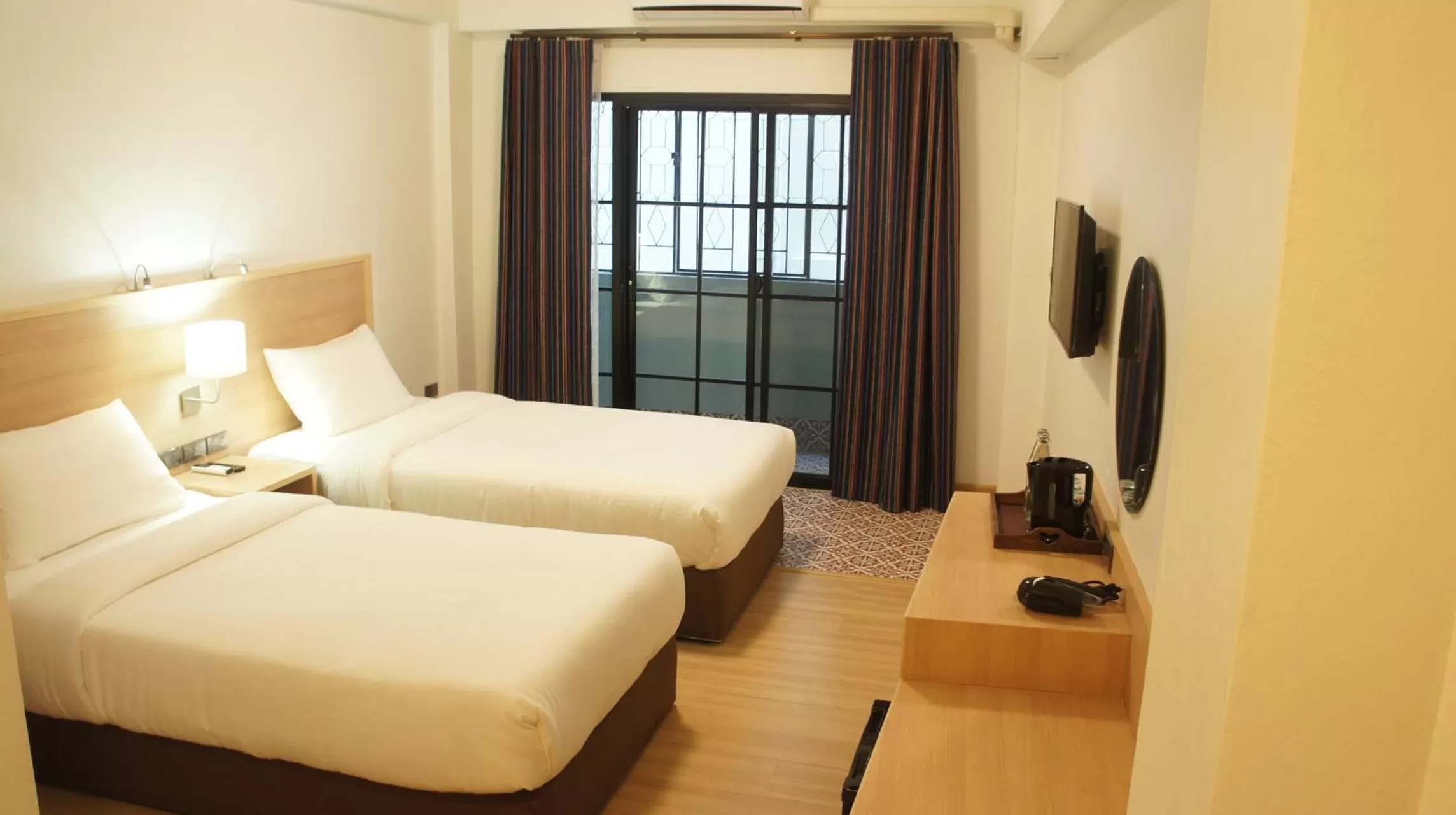 Bed in RCN Court & Inn