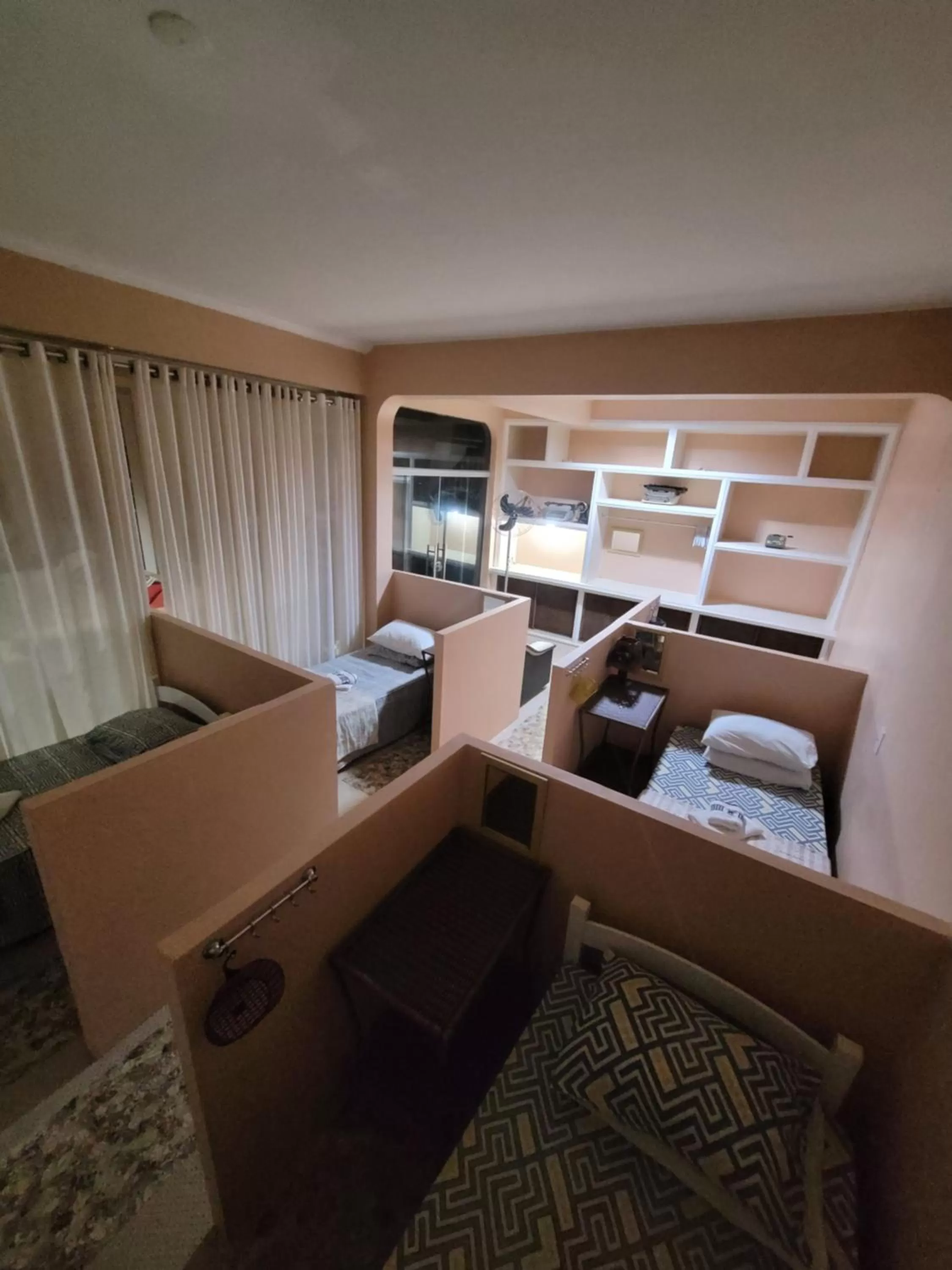 Bed, Seating Area in KzaZendf Cama e Cafe Asa Sul