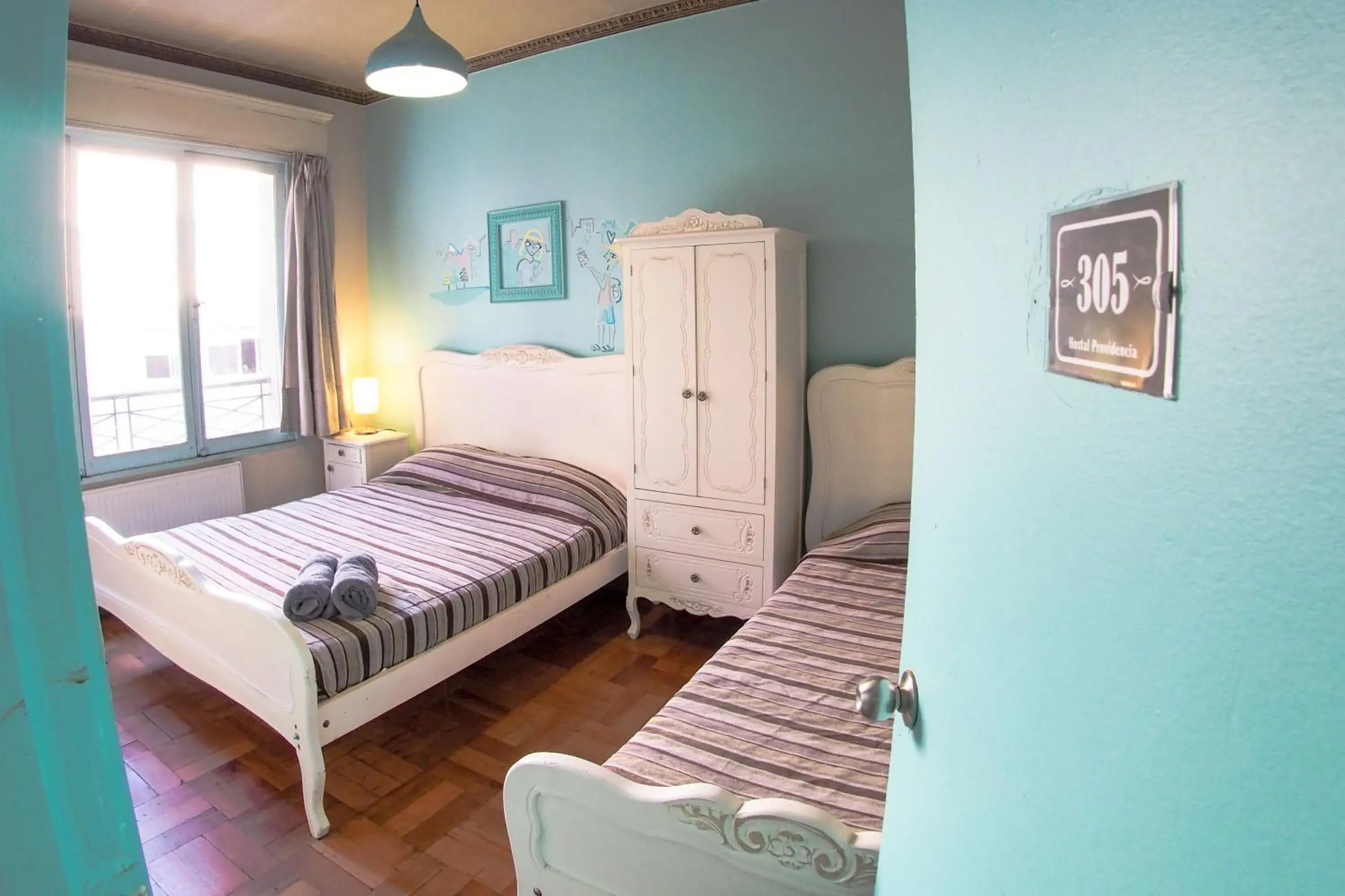 Triple Room with Private Bathroom in Hostal Providencia Triple Room with Private Bathroom in Hostal Providencia