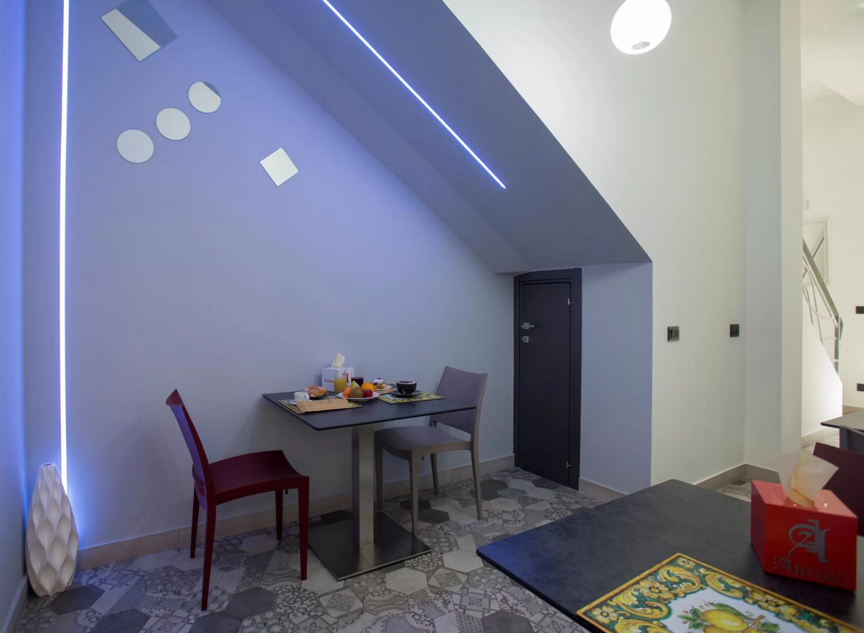 Communal lounge/ TV room in Alterego B&B