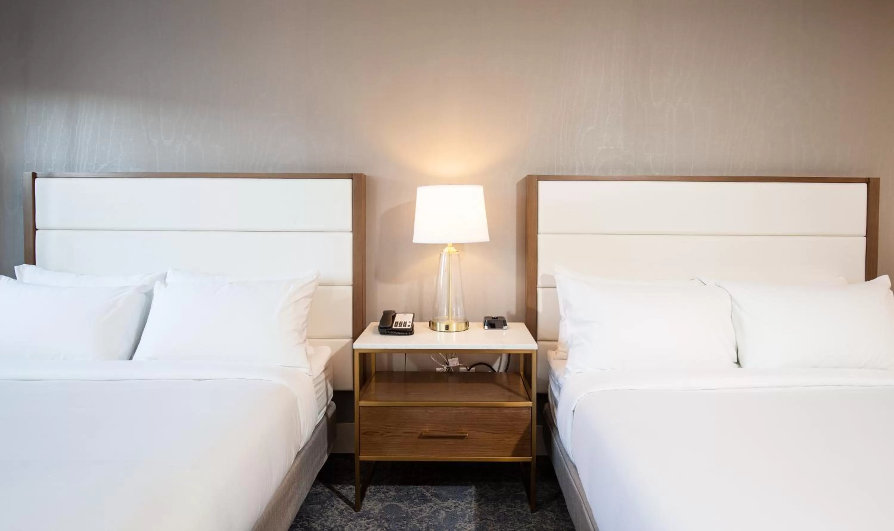 Bed in Pomeroy Hotel Fort McMurray