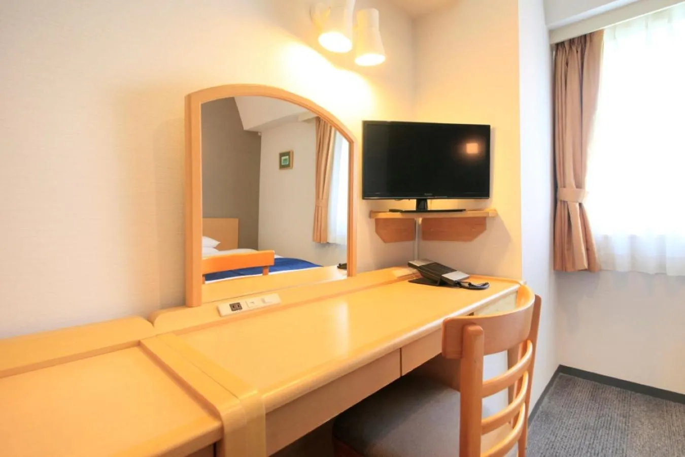 TV and multimedia, Bed in Hotel Grand City