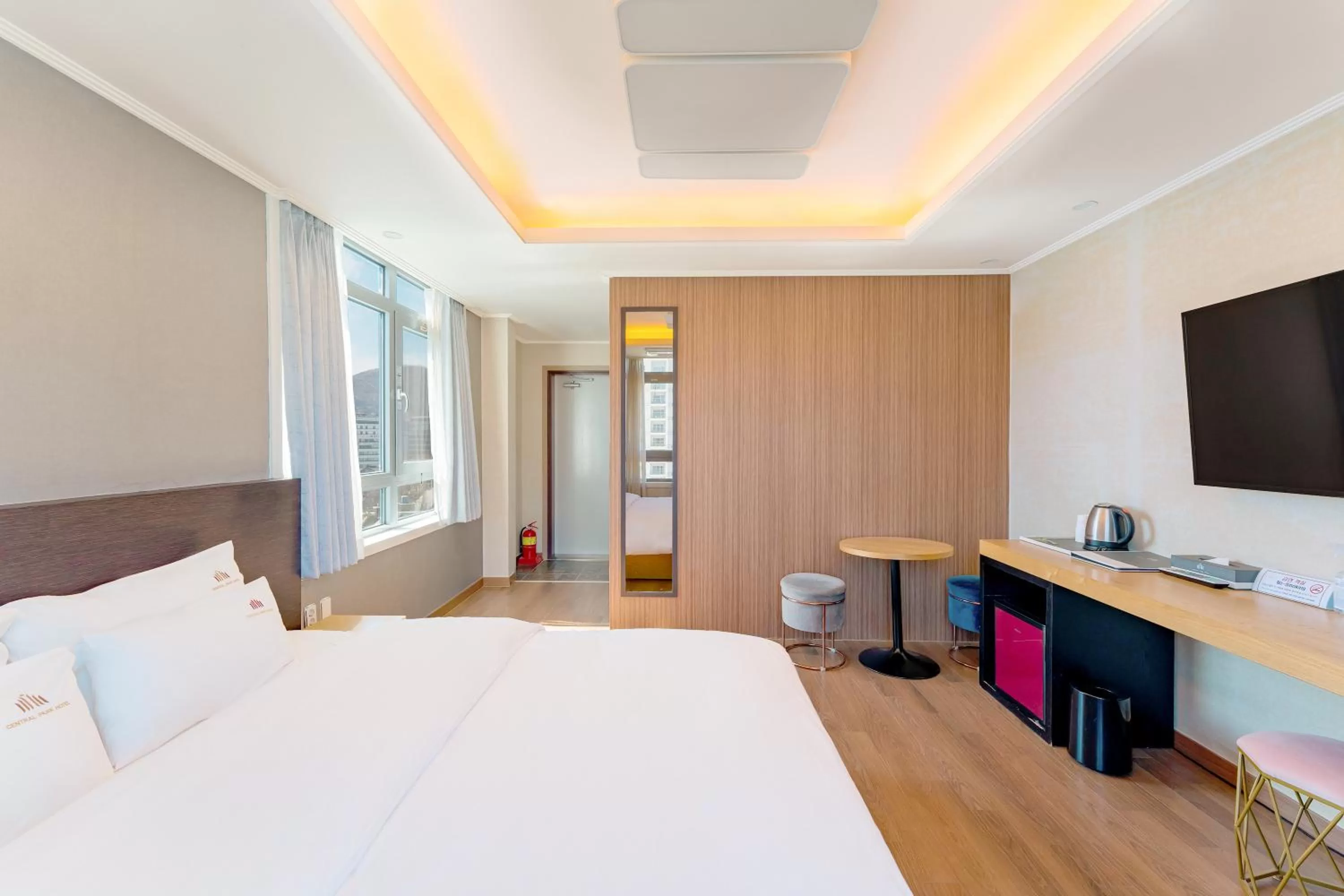 Bed in Central Park Hotel Busan