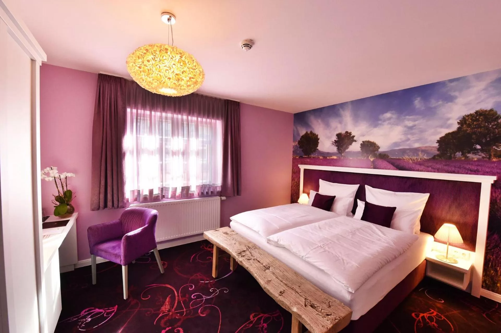 Photo of the whole room, Bed in MOMENTS Boutique Hotel