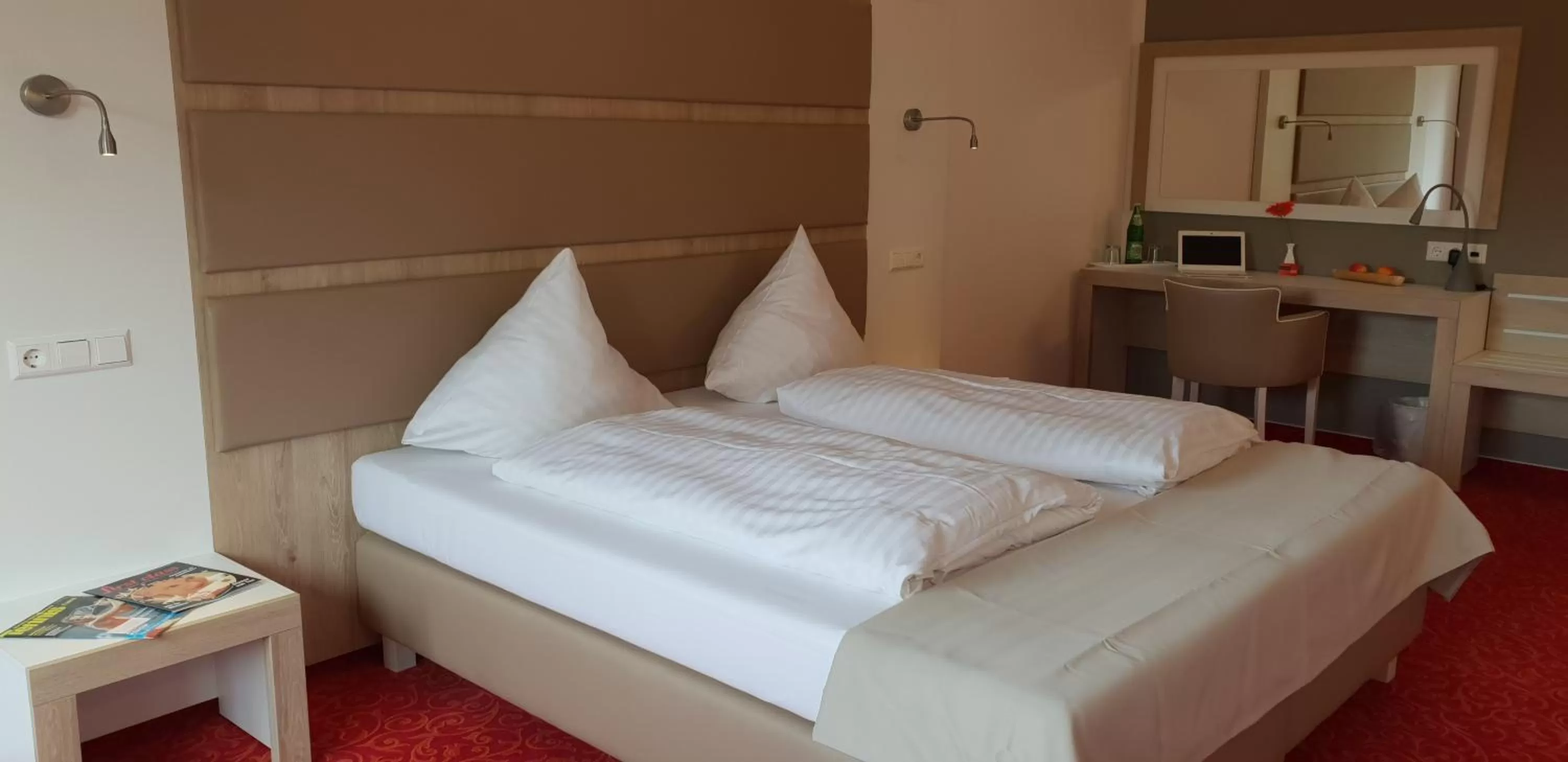 Bed in Confour Hotel