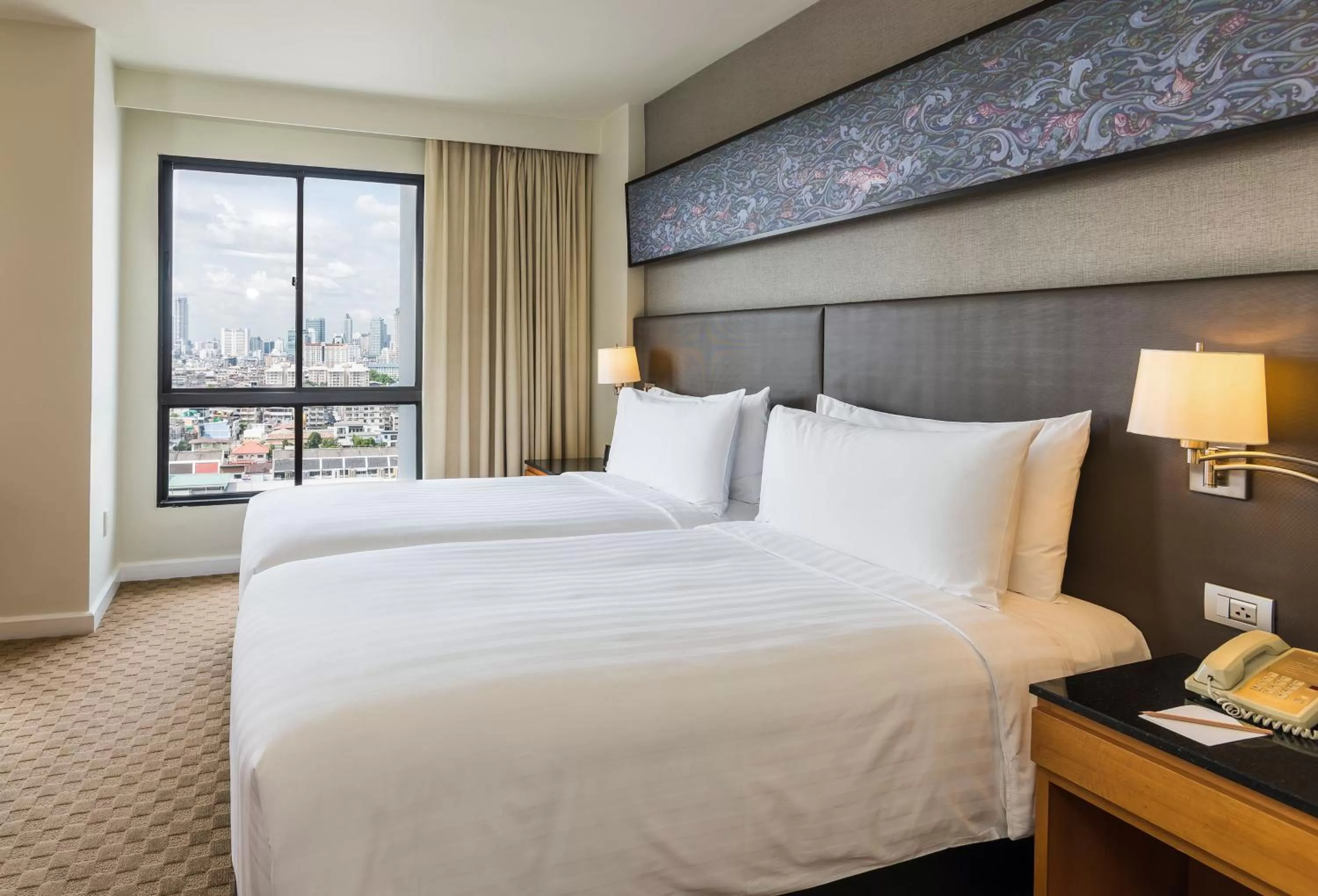 Bed in Chatrium Sathon Bangkok