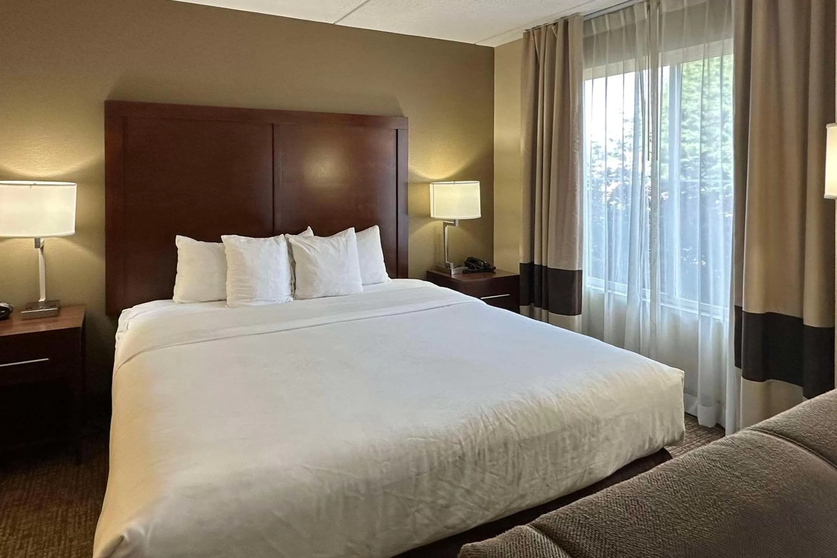 Bedroom, Bed in Charlotte Suites by IHG