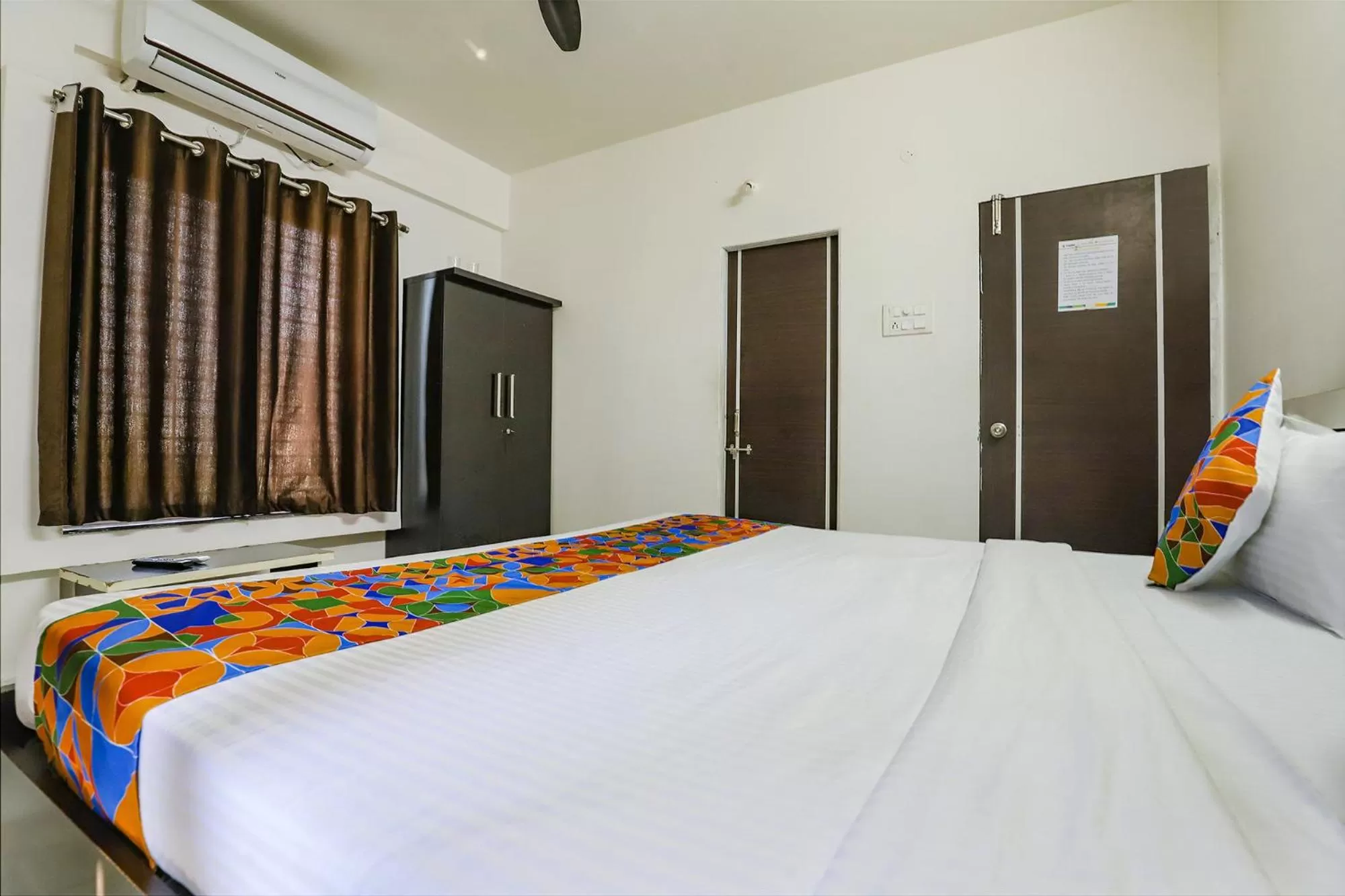 Bed in FabHotel Elite Palm