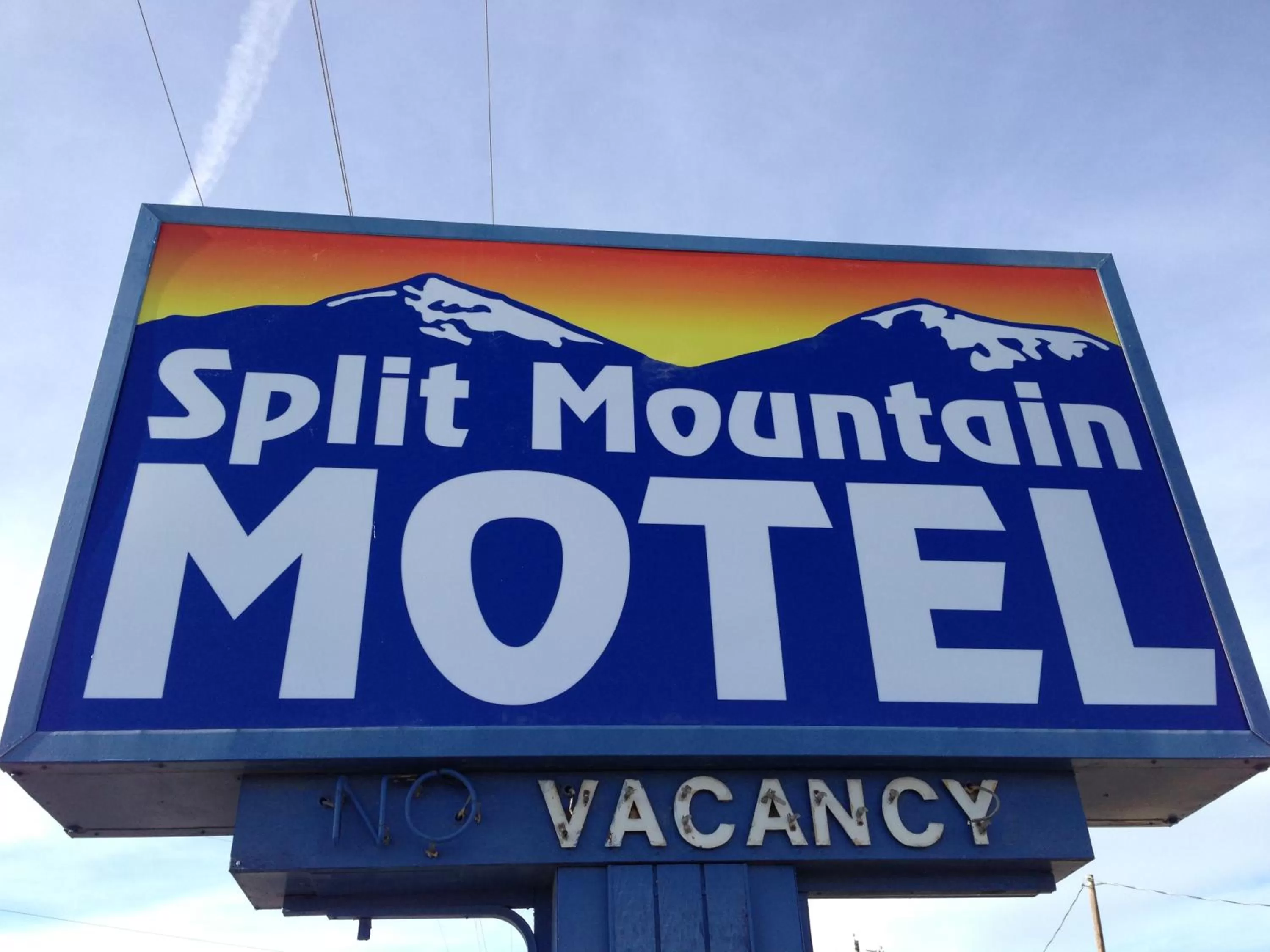 Property logo or sign in Split Mountain Motel