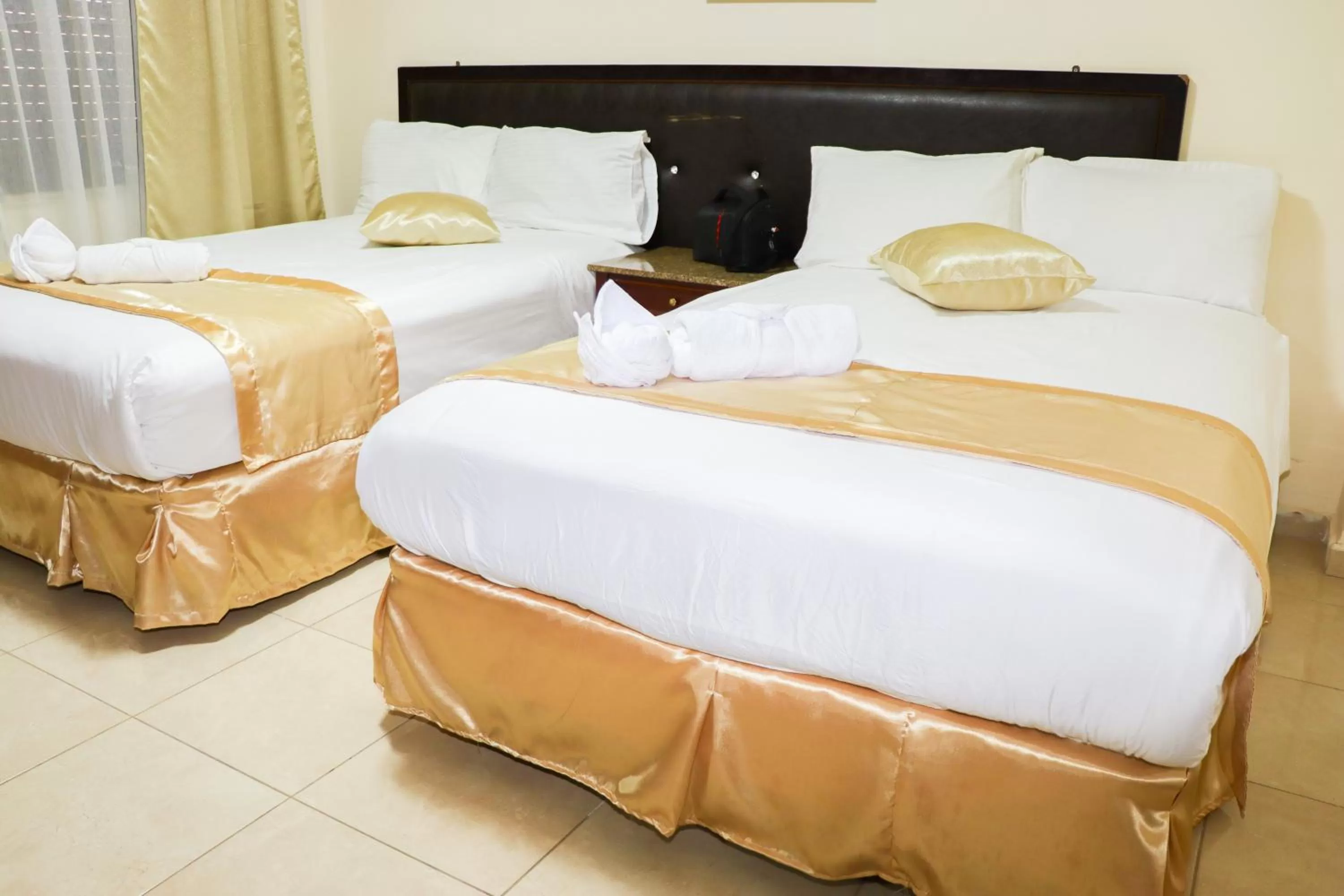 Bed in Al Jamal Suites