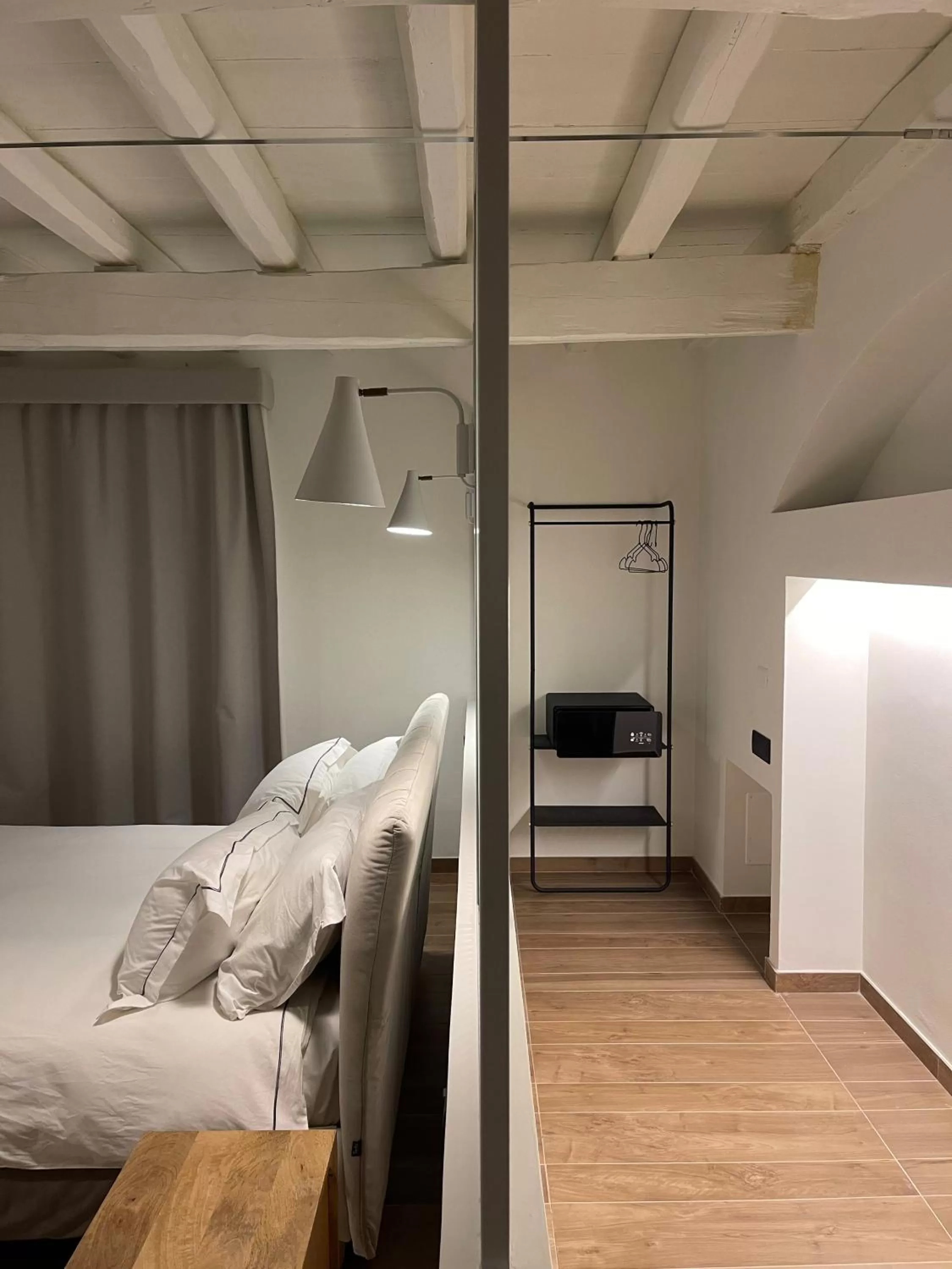 Photo of the whole room, Bed in Raha Suites