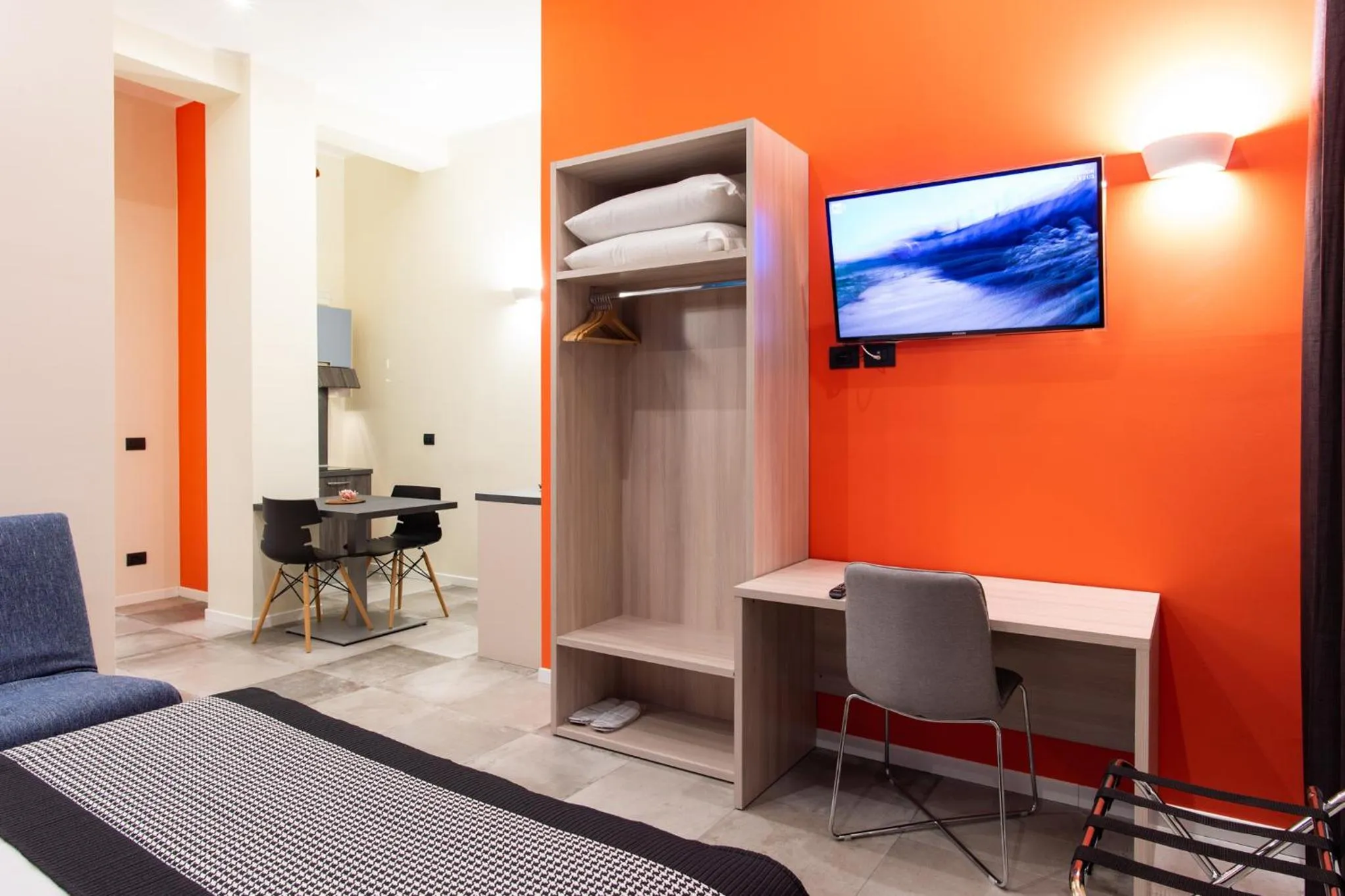 Living room, Bed in Aparthotel Porta Nuova