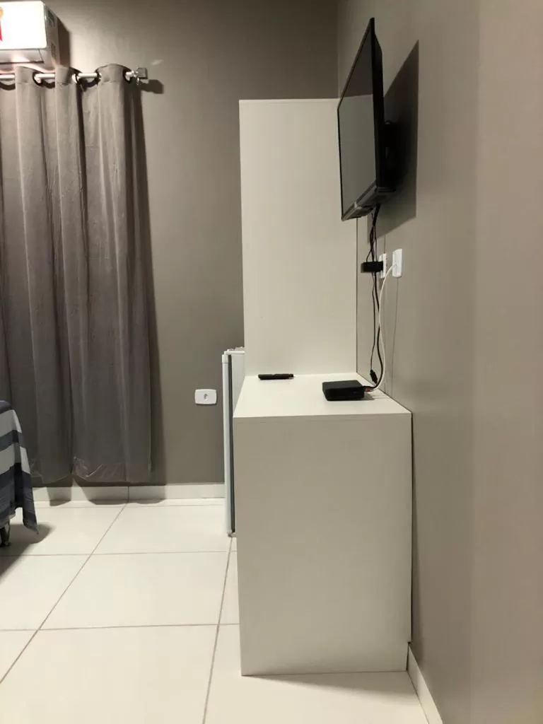 TV/Entertainment Center in Pousada Praia Bela