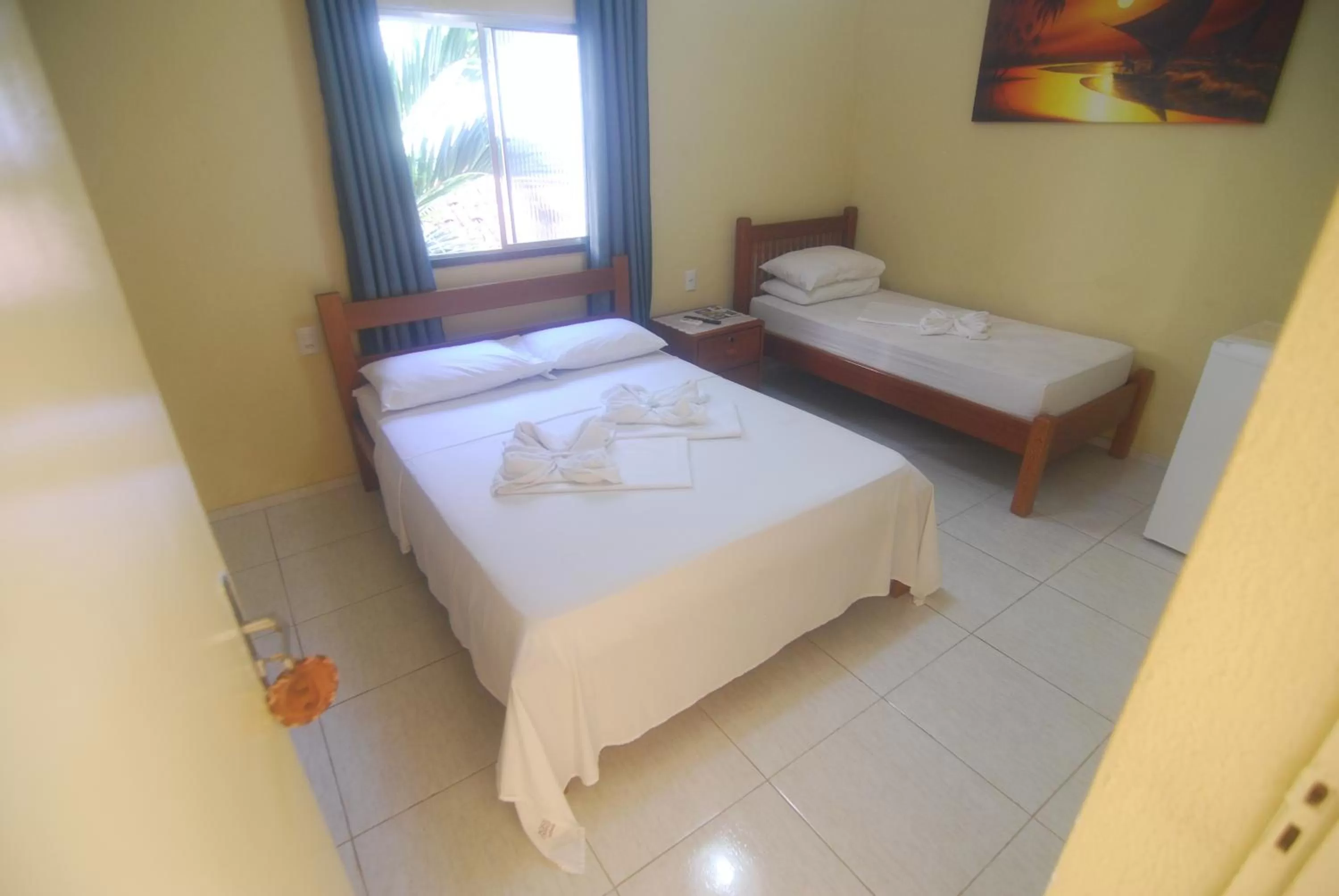 Bed in Refúgio Pousada Fortaleza