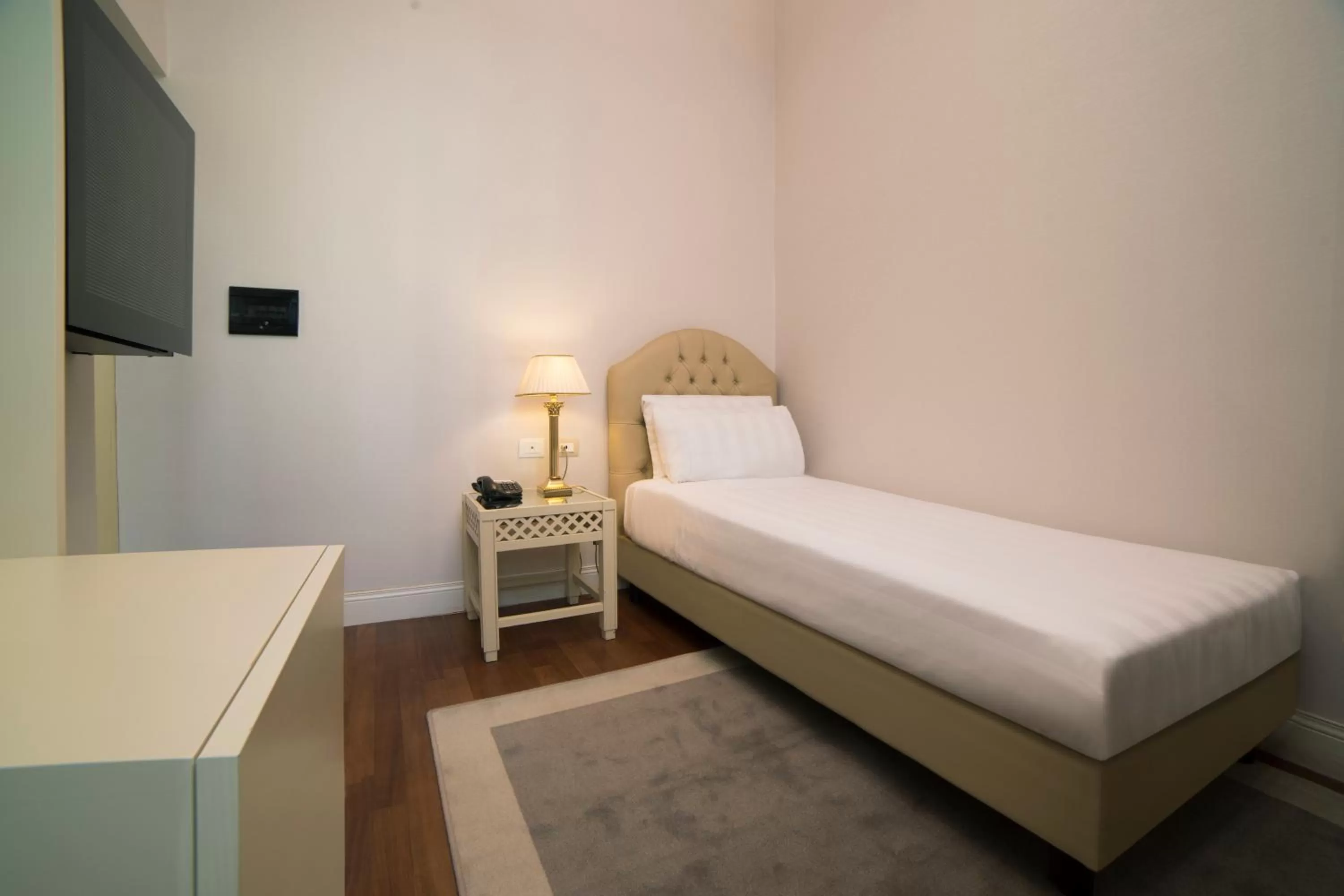 Bed in Radisson Blu GHR Rome