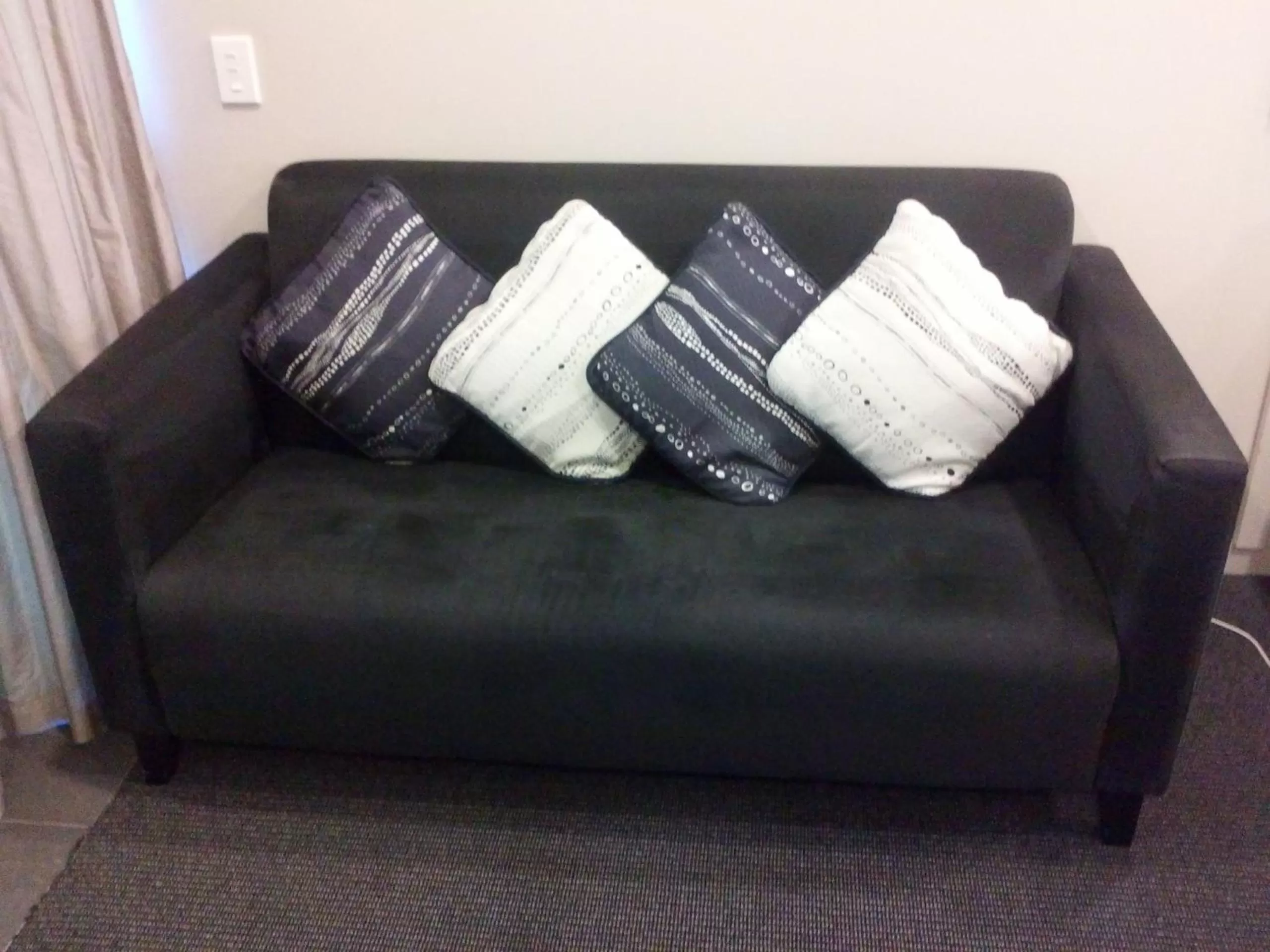 Seating area in Azena Suites & Apartment