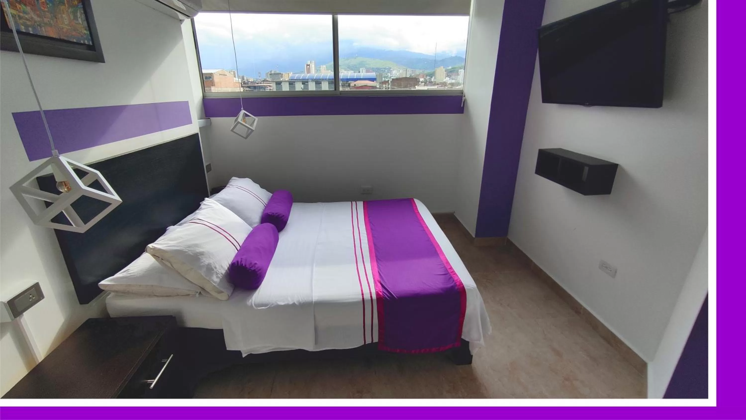 View (from property/room), Bed in HOTEL COLOURS Cali