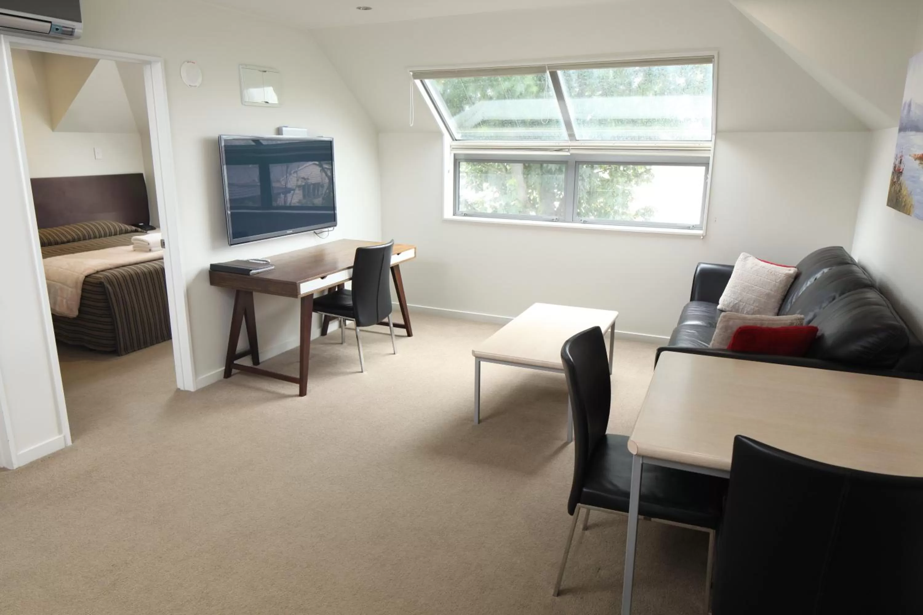Living room in Alpha Motel with Spa-Bath