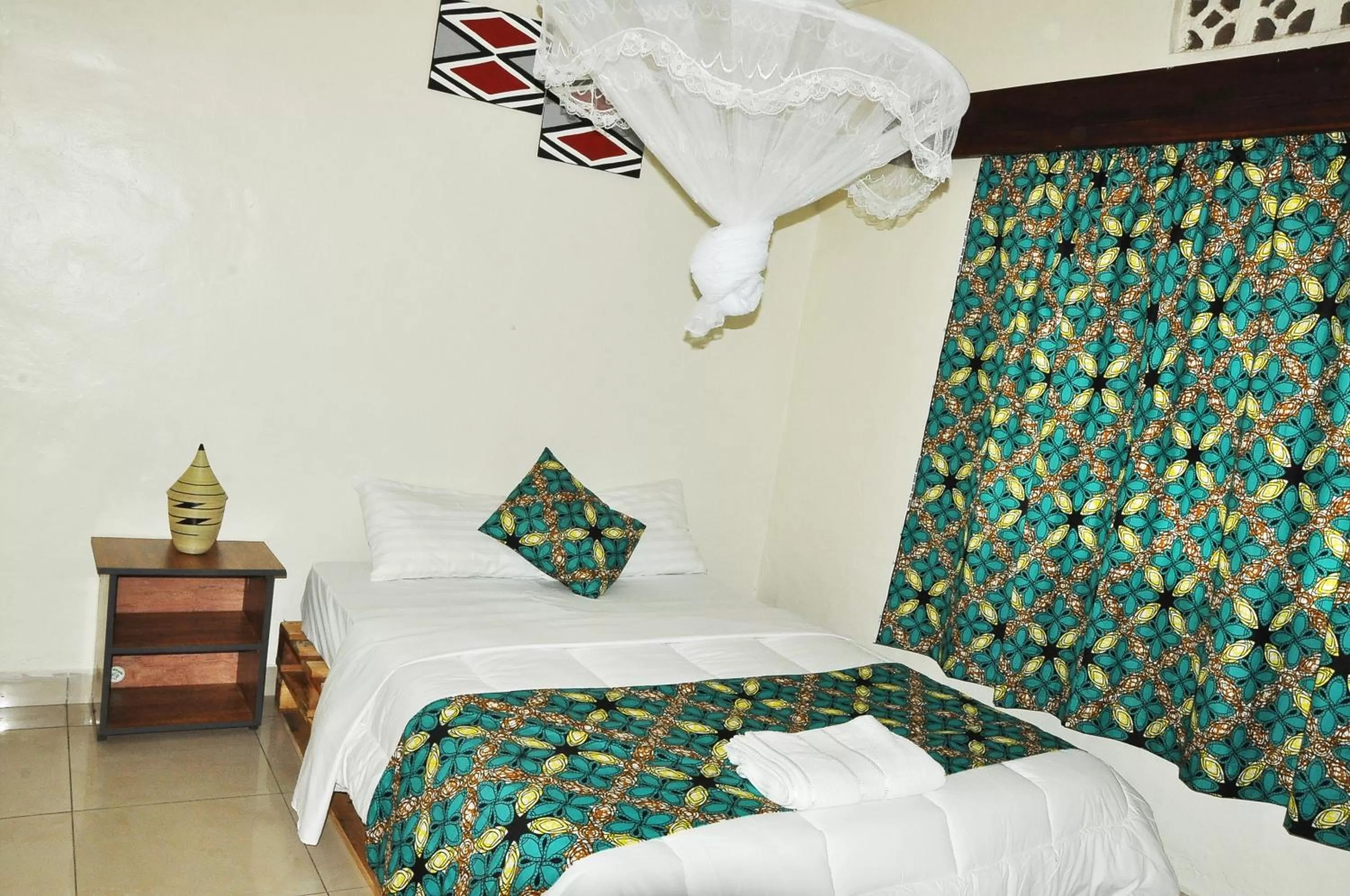 Bed in INZOZI AFRICA HOUSE B&B- Kacyiru