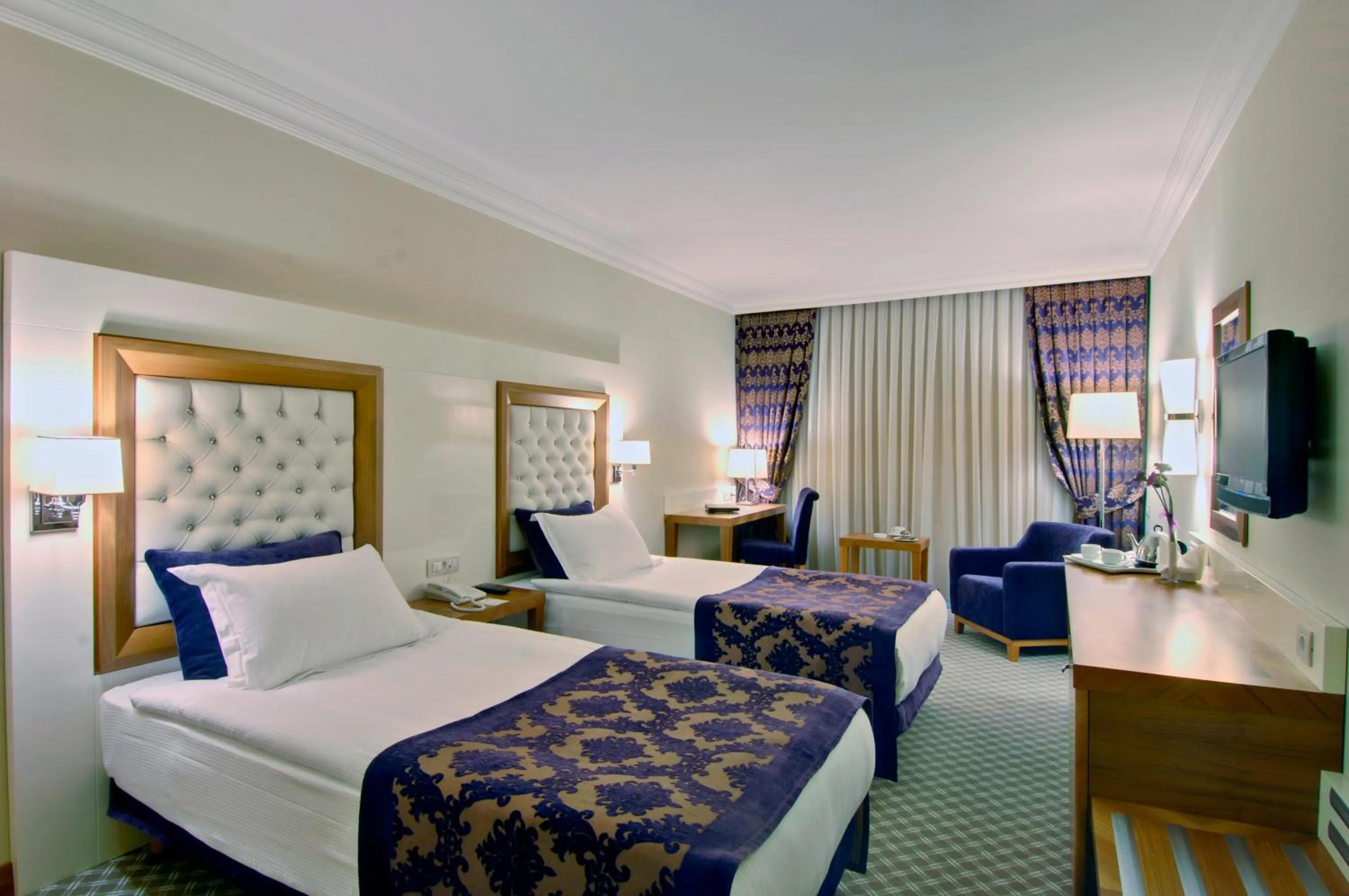 Bed in Tugcu Hotel Select