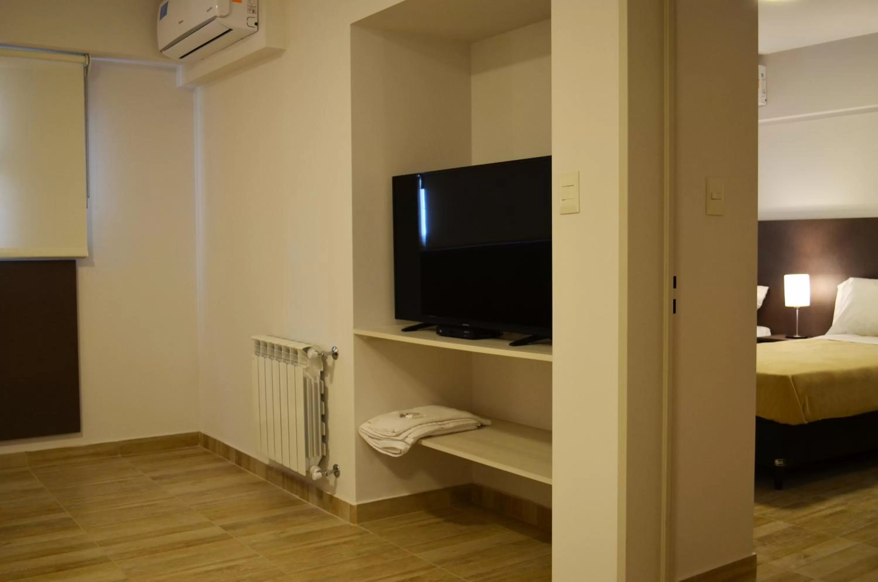 TV and multimedia, TV/Entertainment Center in Hotel Bait