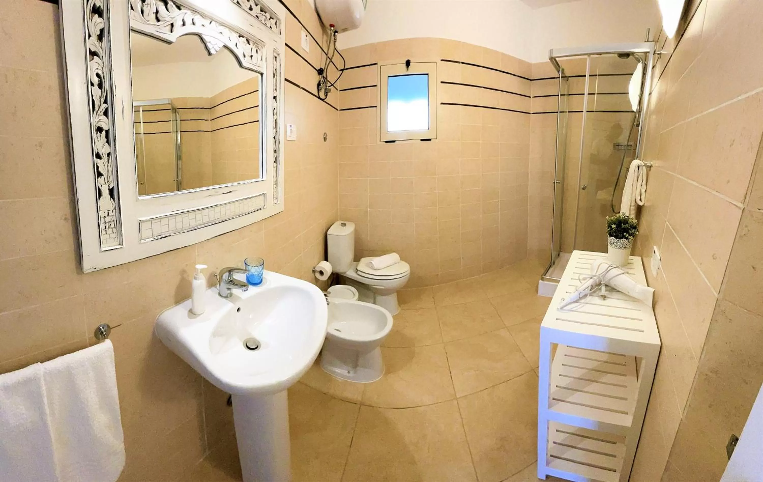 Shower in Branco Suites - Rooms & Holiday Apartments