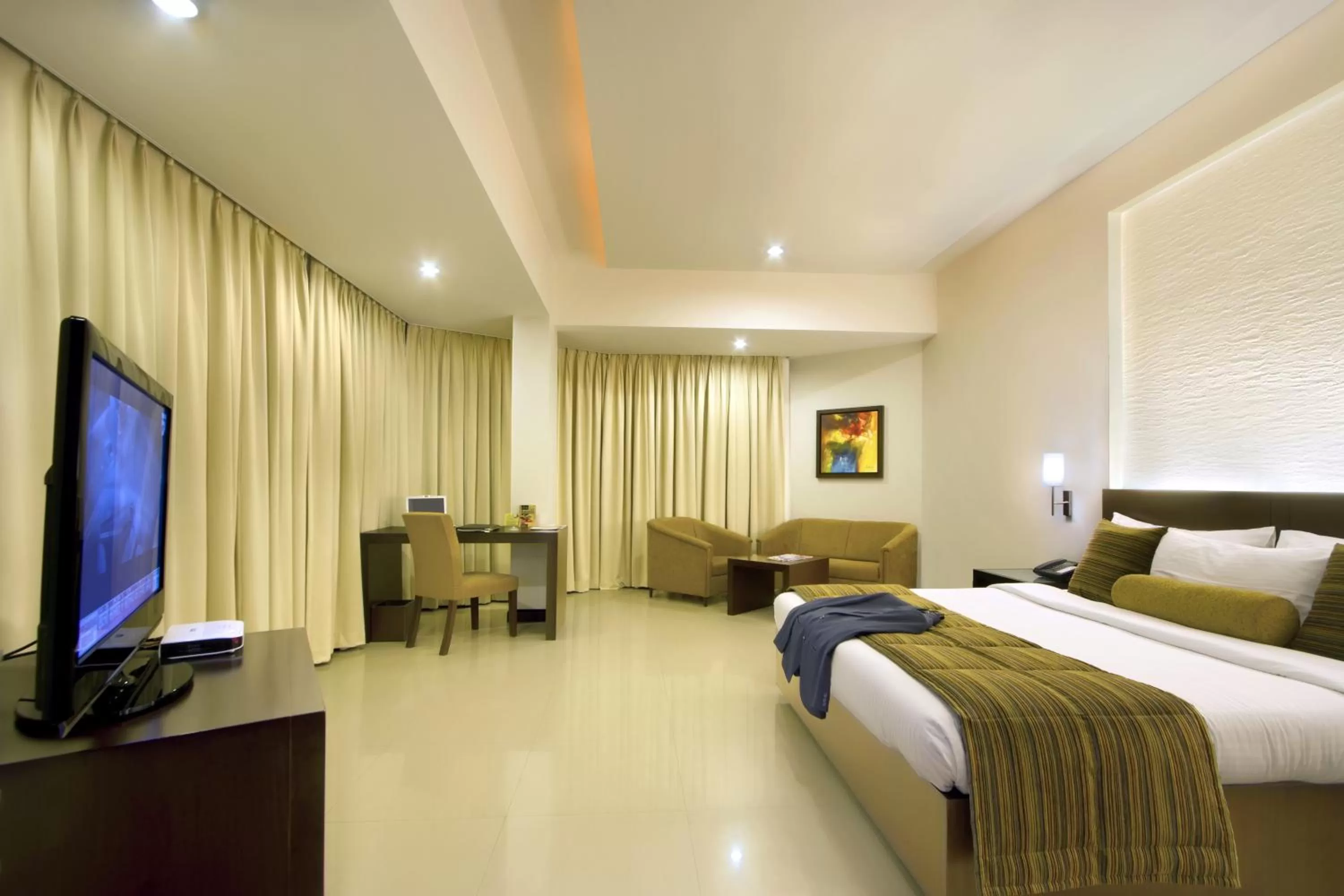 Photo of the whole room, Bed in Hotel Express Residency Vadodara