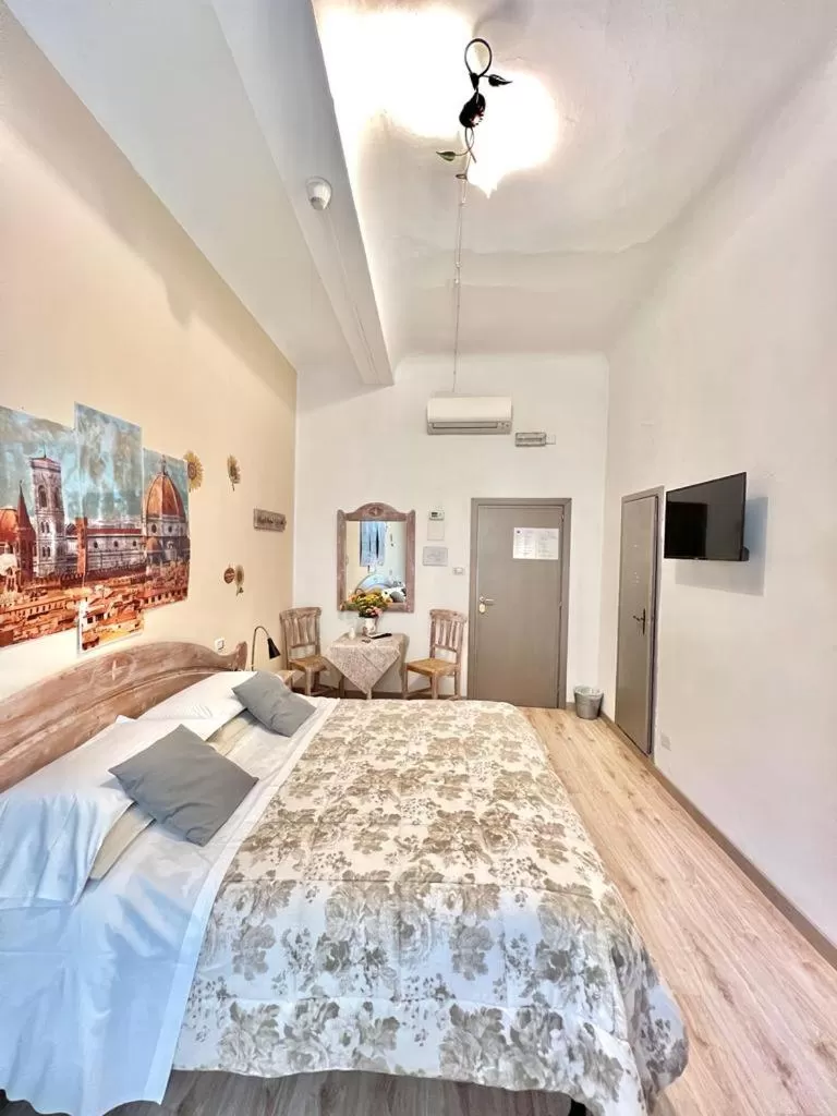 Bed in Cicerone Guest House