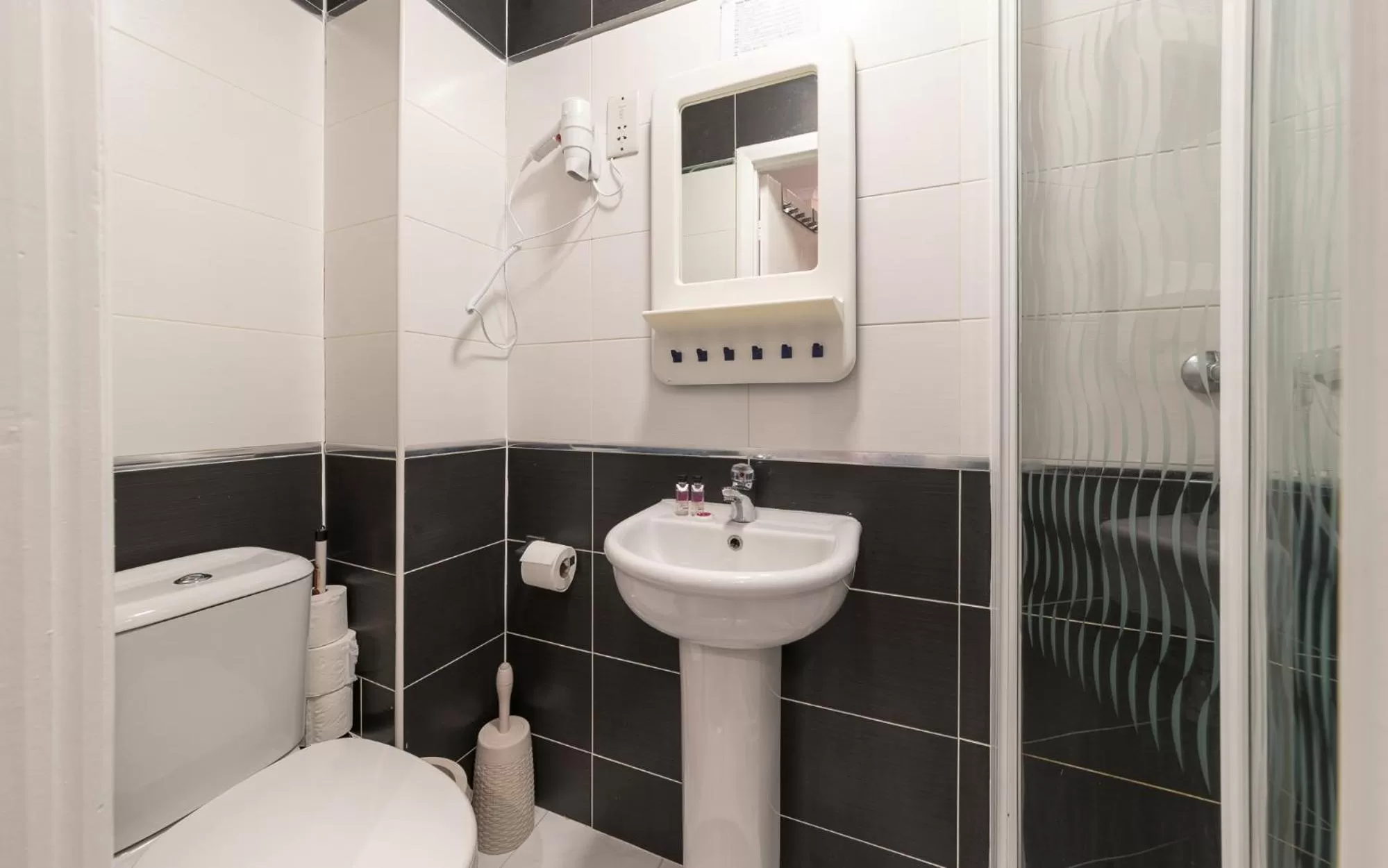 Bathroom in Hellenic Hotel by Saba