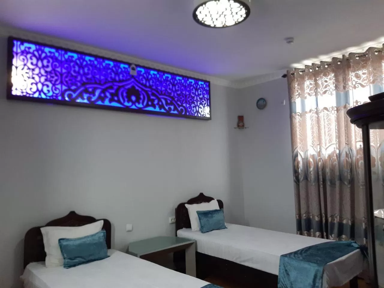 Bed in Risqiro'z Ancient Boutique Hotel