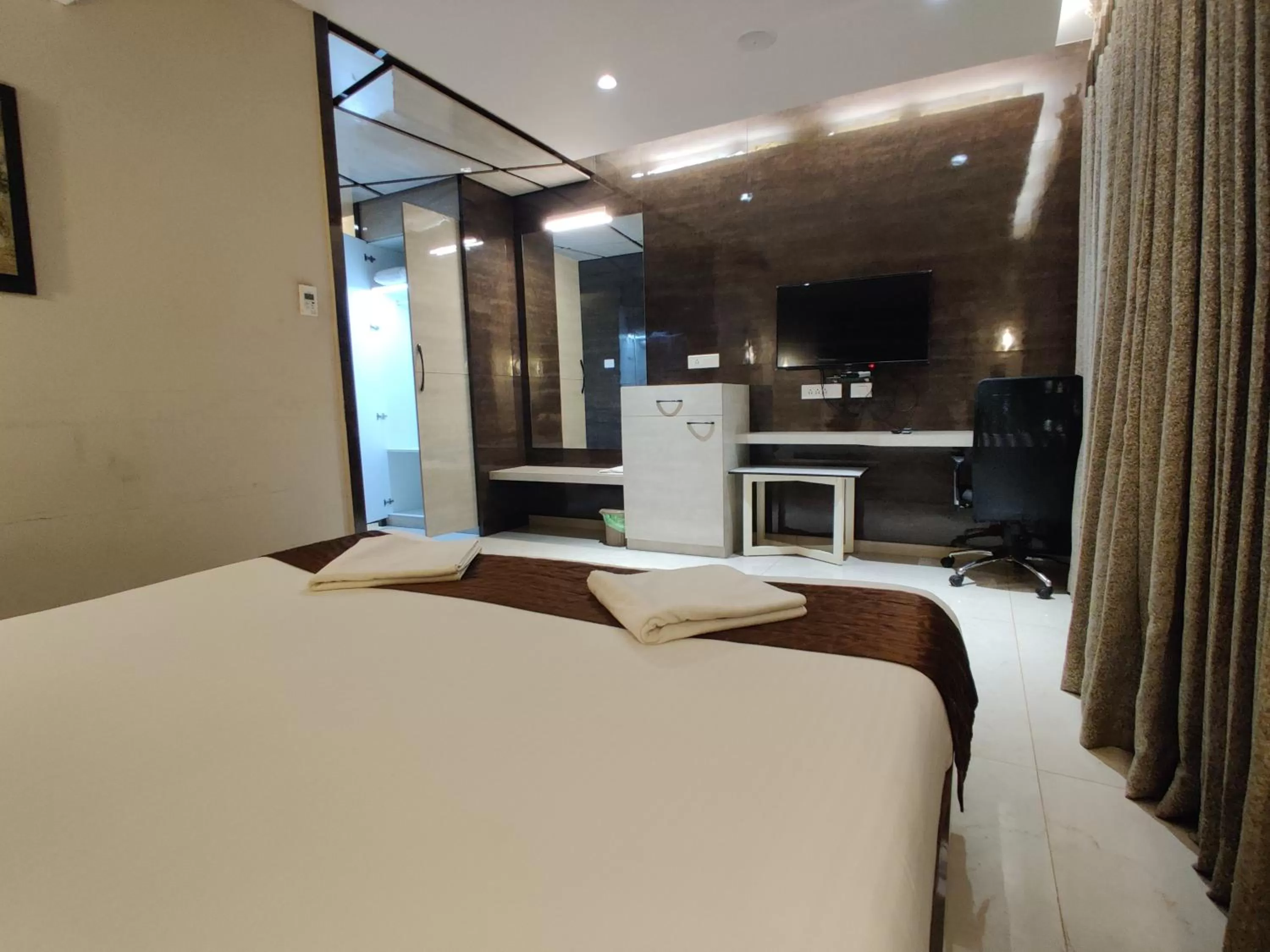 Photo of the whole room, Bed in Neermala Residency