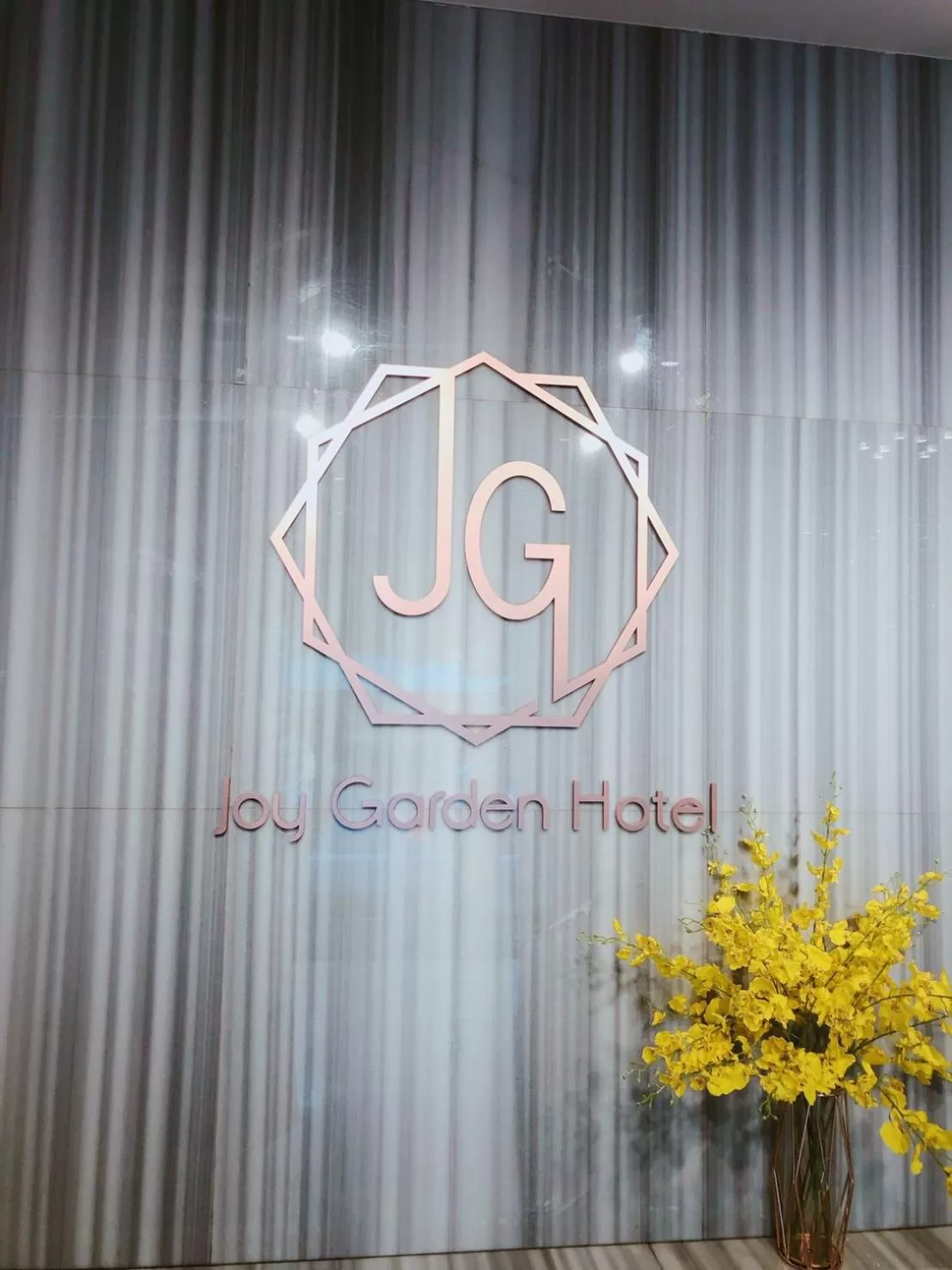 Property logo or sign in Joy Garden Hotel