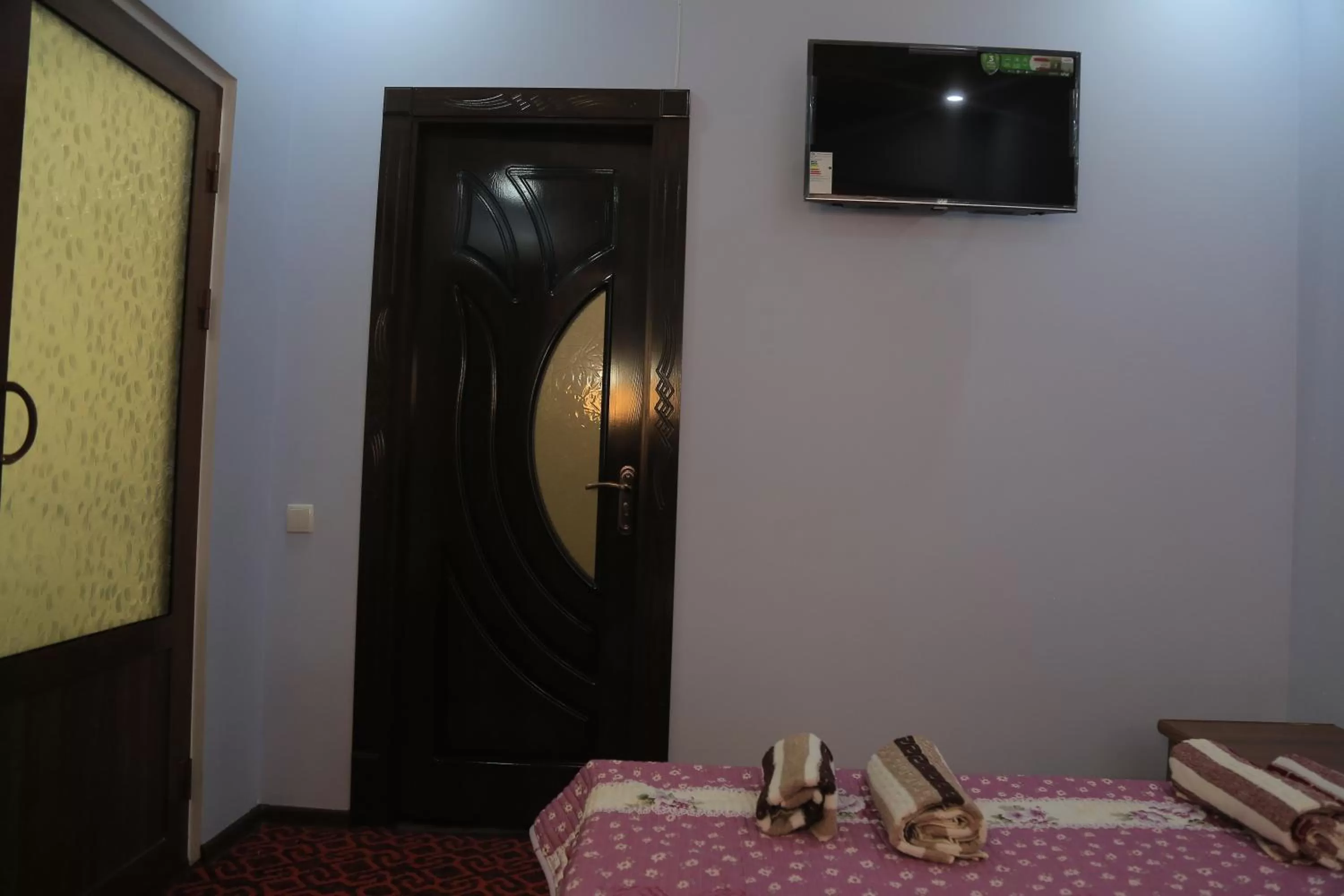 Communal lounge/ TV room, TV/Entertainment Center in Alliance hotel bukhara