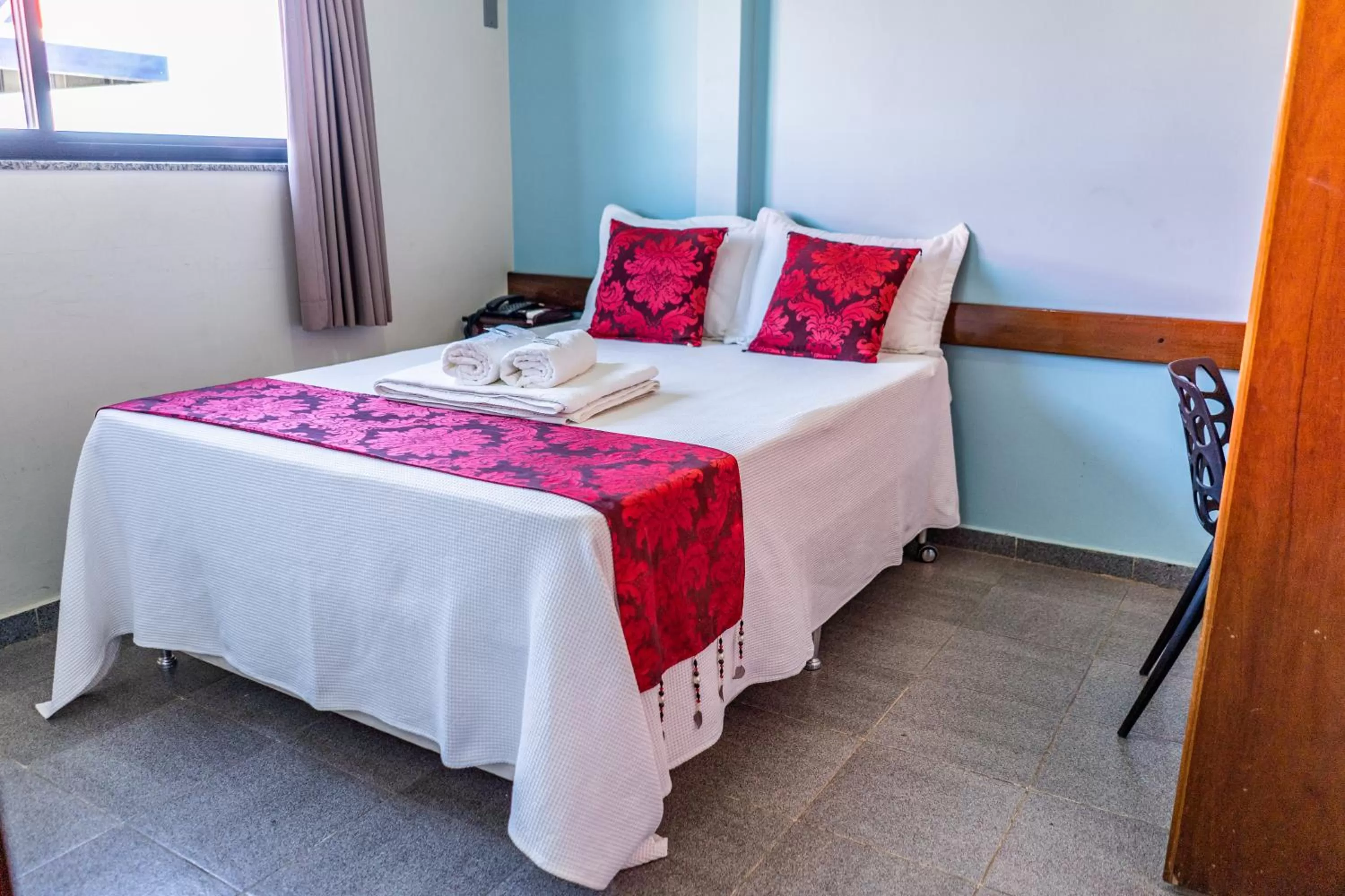 Bed in Pousada Paraiso