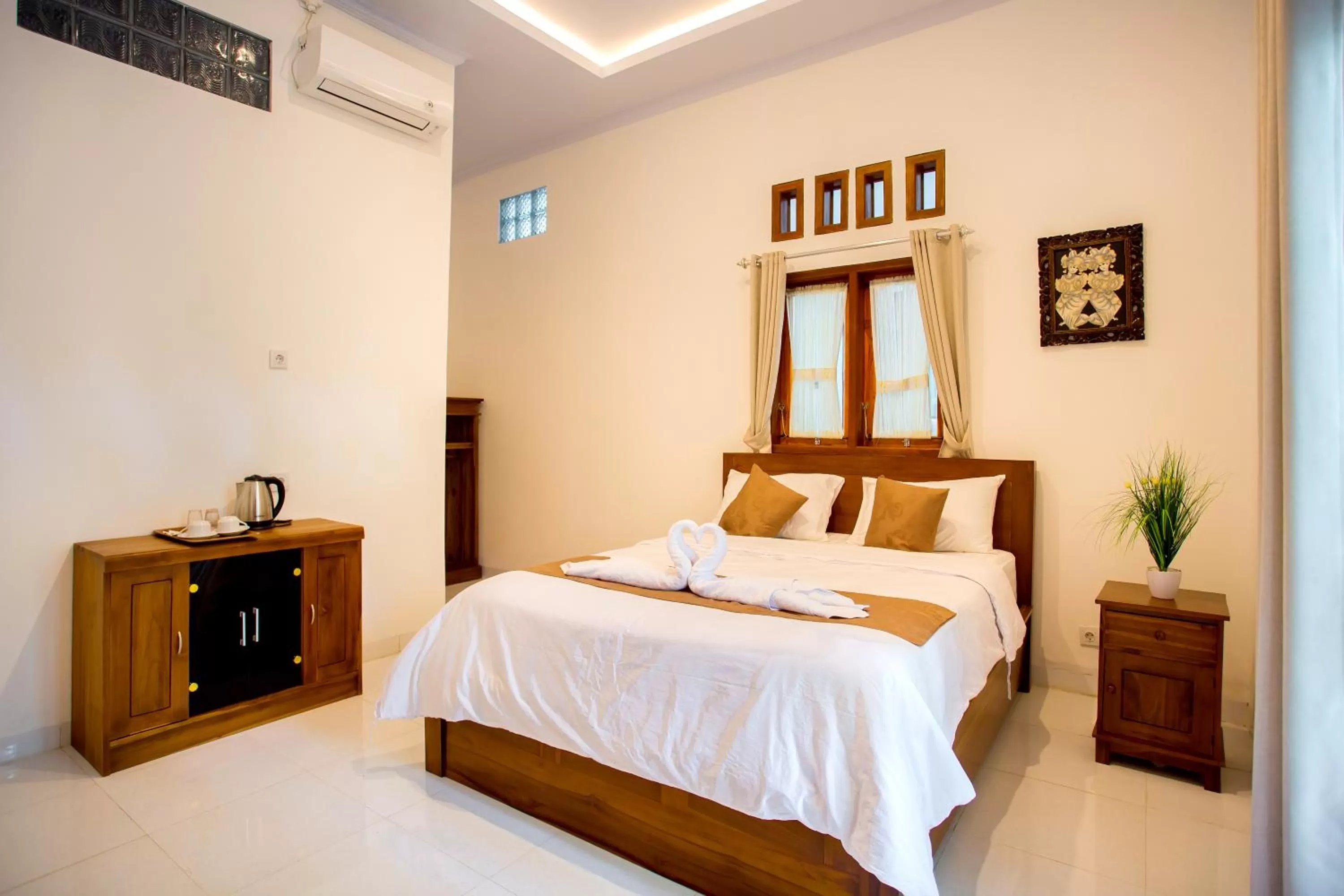 Bed in The Puncak Santhi Inn