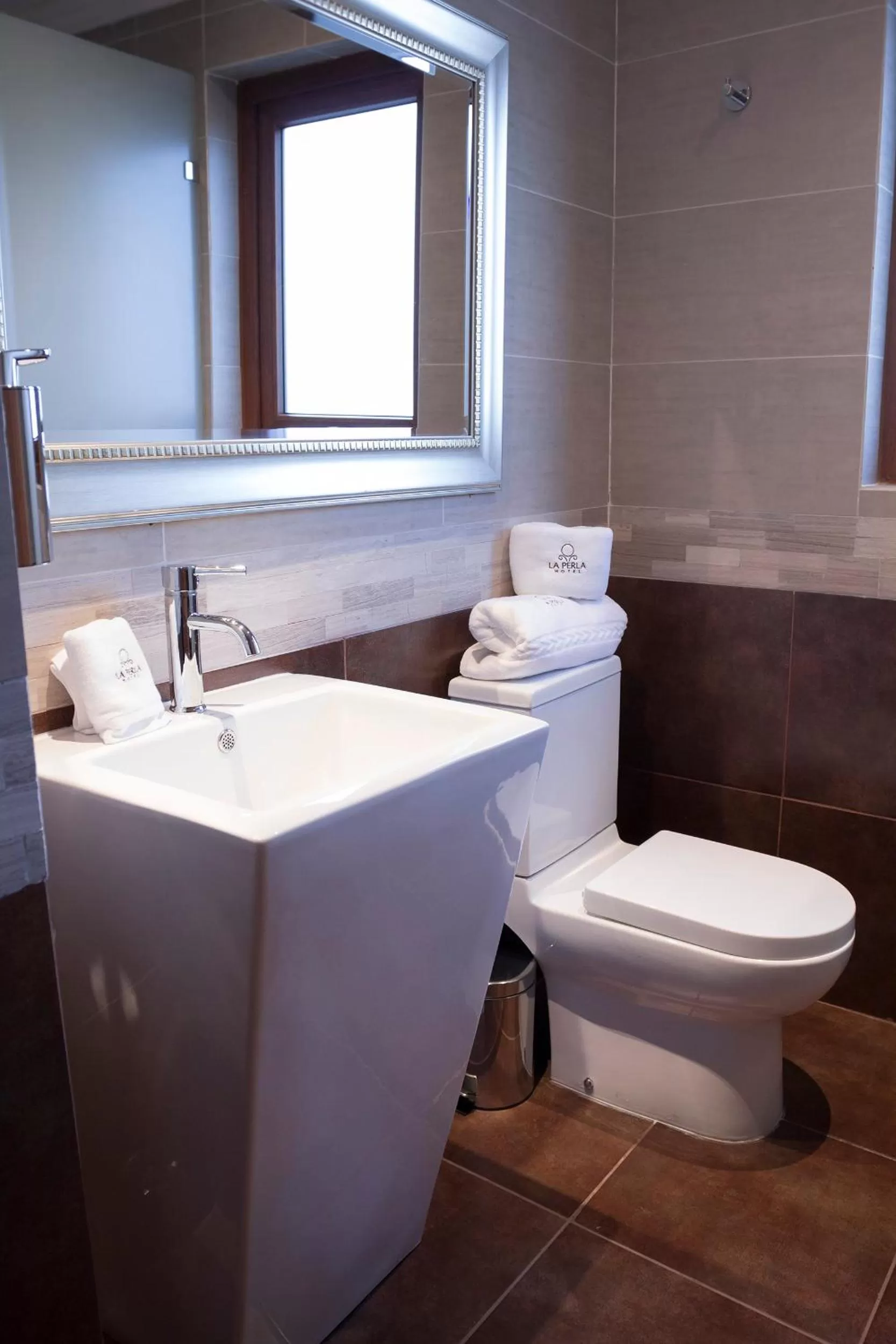 Bed in La Perla Hotel