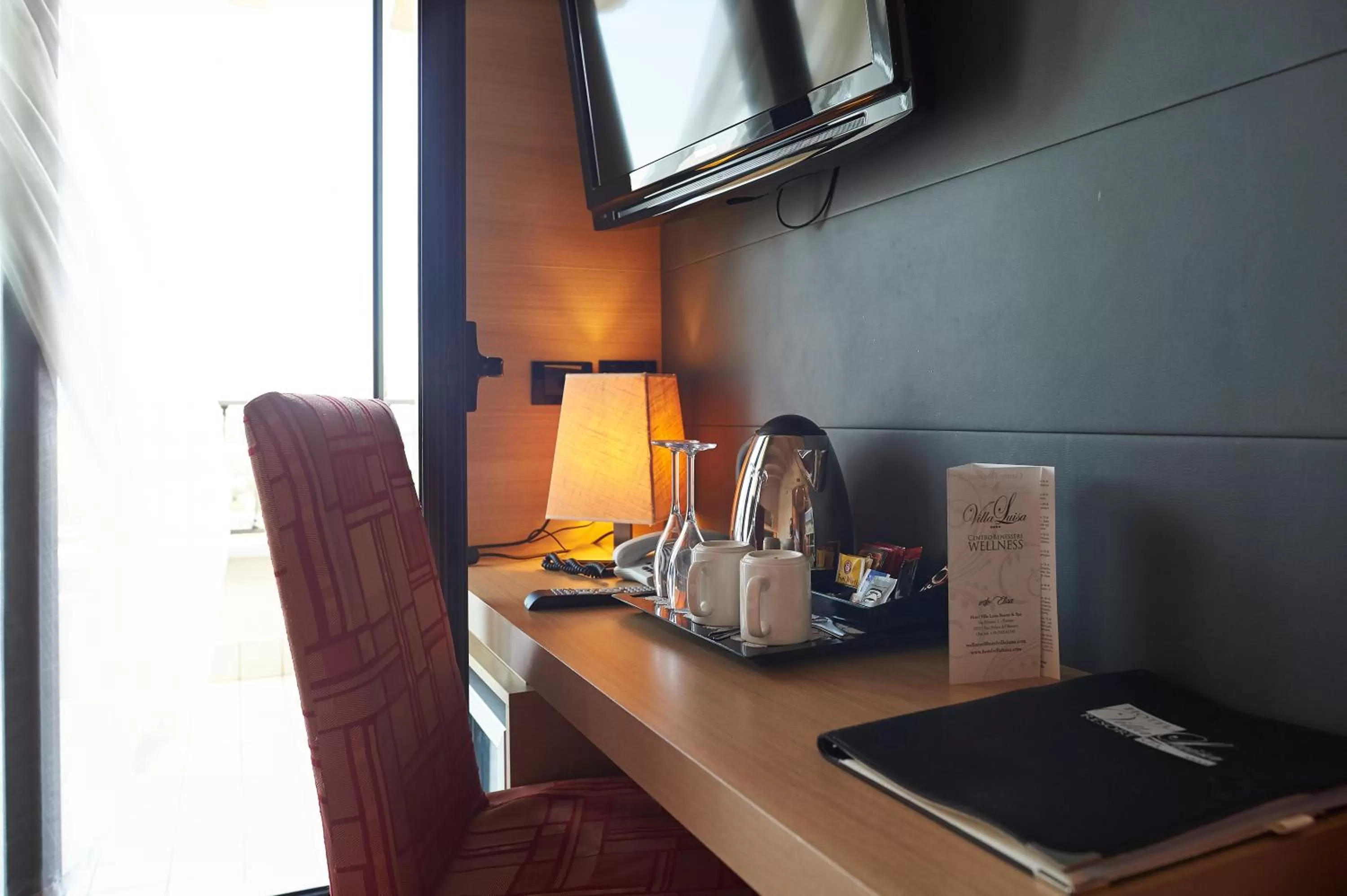 TV and multimedia in Villa Luisa Resort & Luxury Apartments