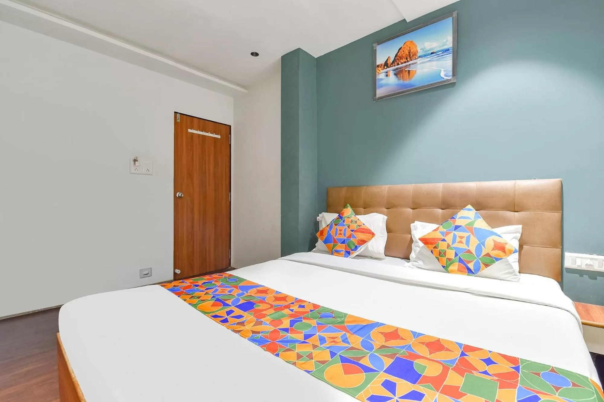 Bed in FabHotel Nidhivan, Udhna Junction