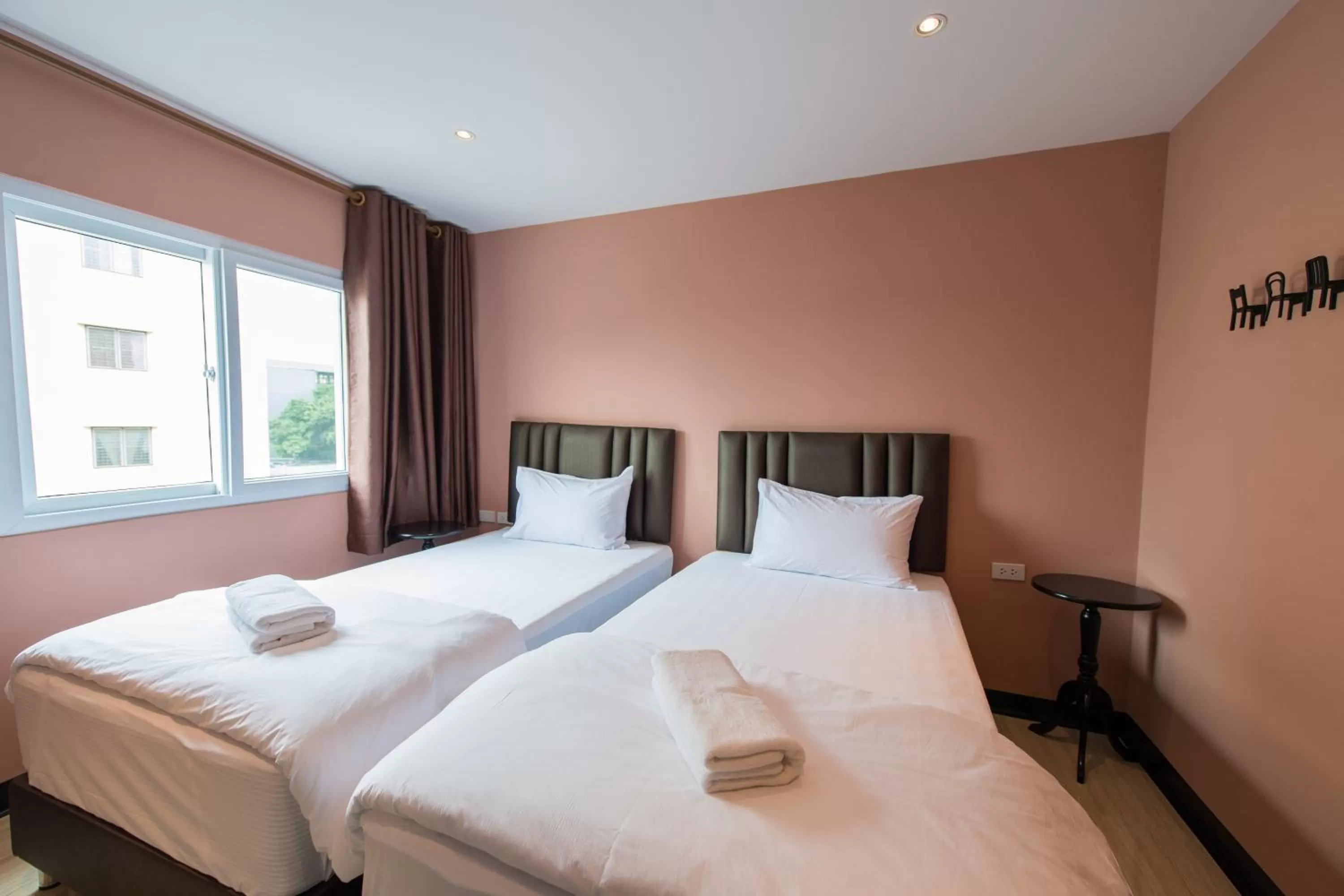 Bed in Let's Zzz Bangkok