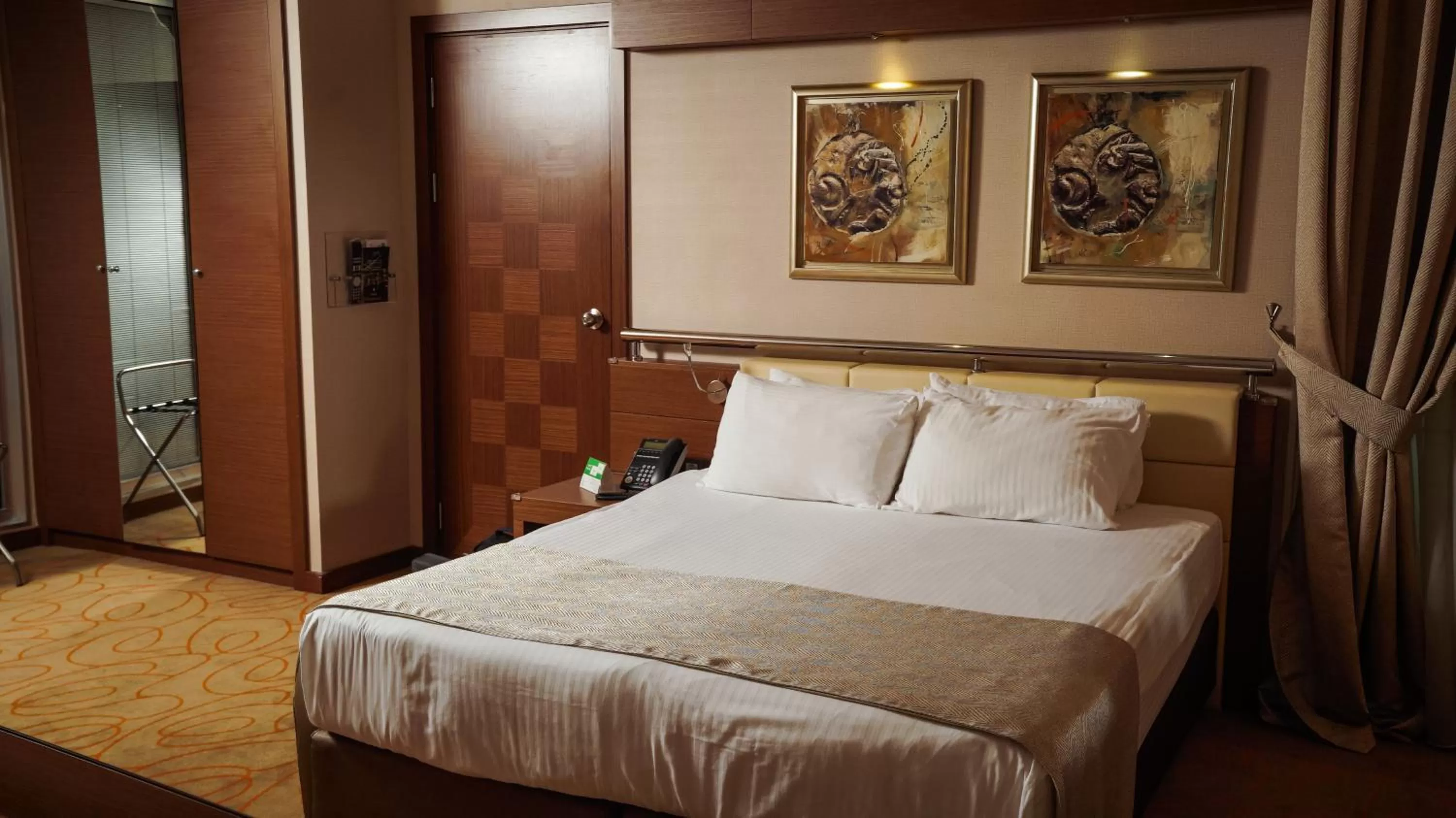 Bed in Holiday Inn Ankara-Kavaklidere by IHG